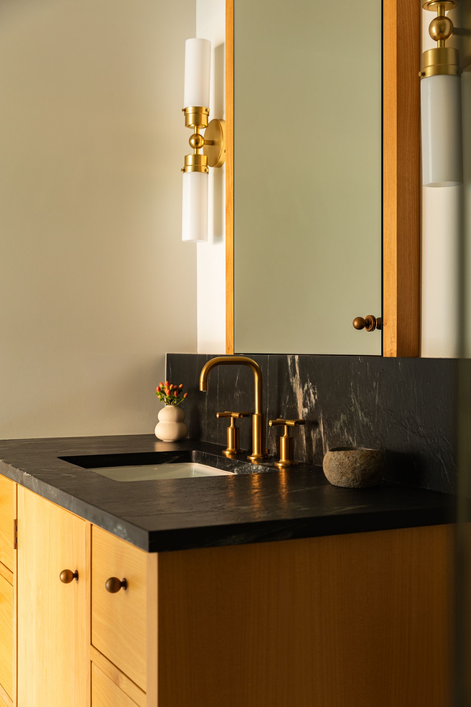 Moody bathroom vanity with Rejuvenation fixtures built by Eric Gruendyke and professionally photographed by Kristen Cox