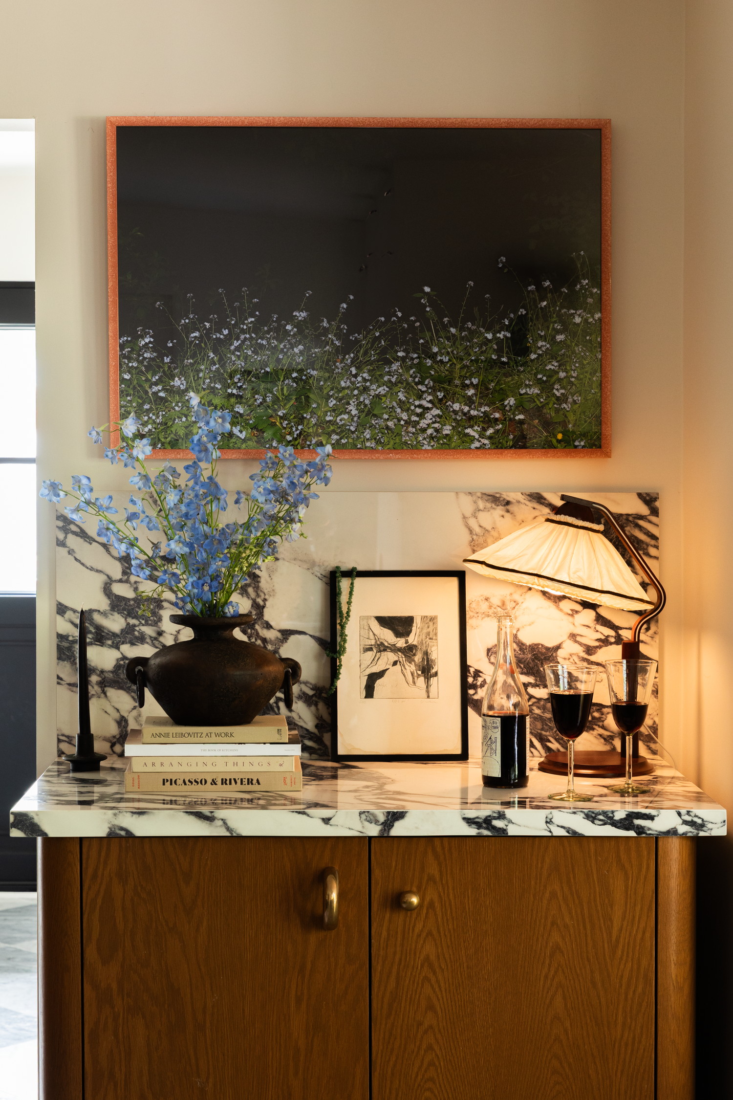 Modern Los Angeles marble kitchen with vintage decor designed by Asia Ragland Hall and photographed by Kristen Cox