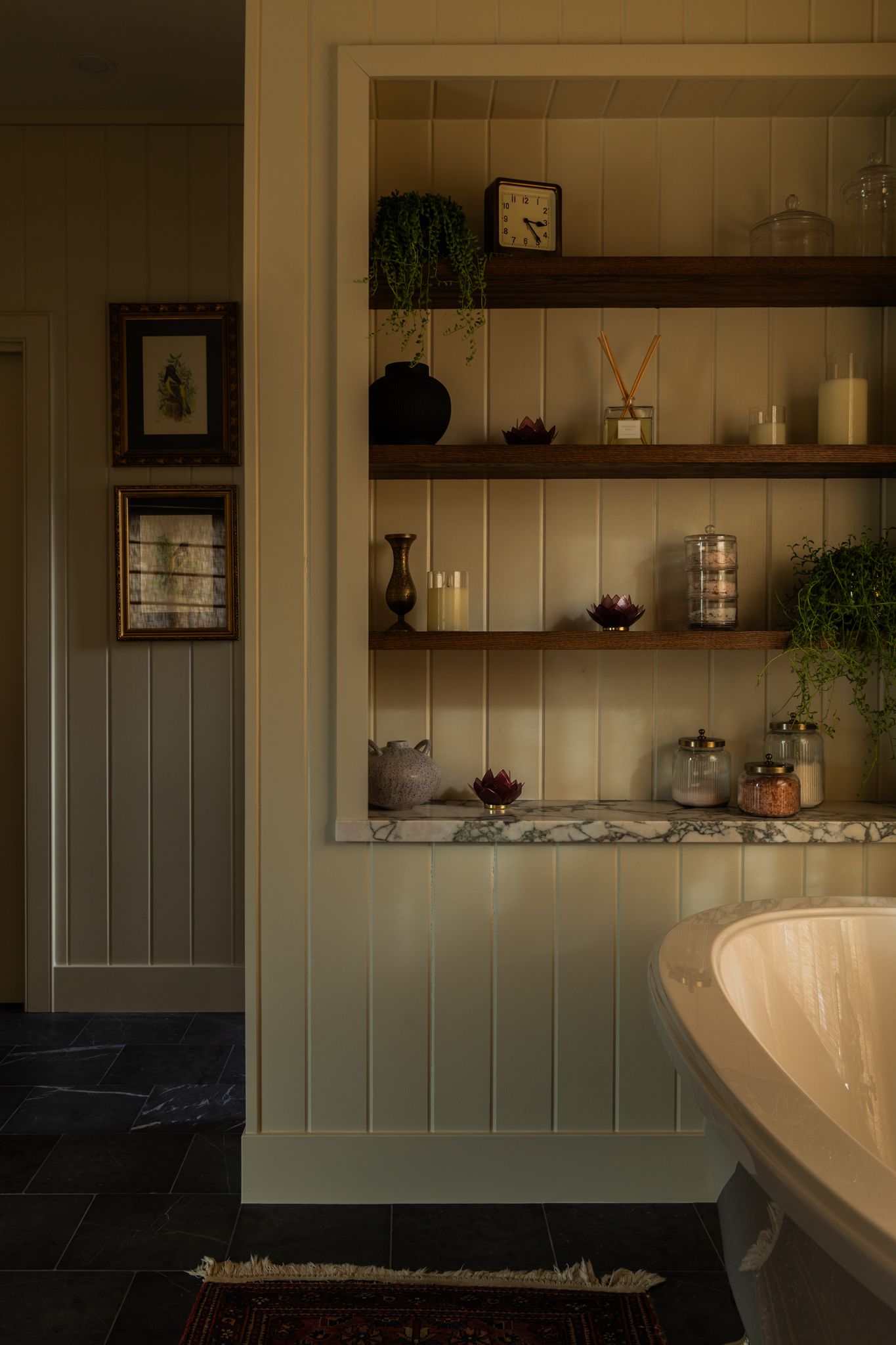 Moody natural light standing bath tub in Yorba Linda designed by Cait Sourapas and photographed by Kristen Cox