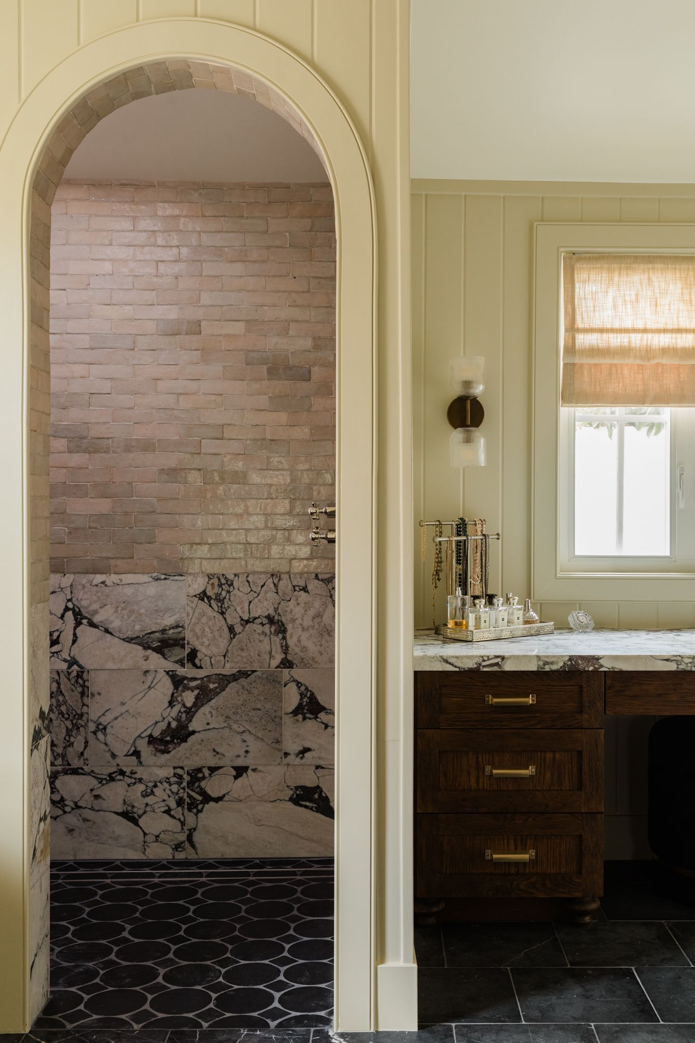 Traditional mixed material primary bath in Yorba Linda designed by Cait Sourapas professionally photographed by Kristen Cox
