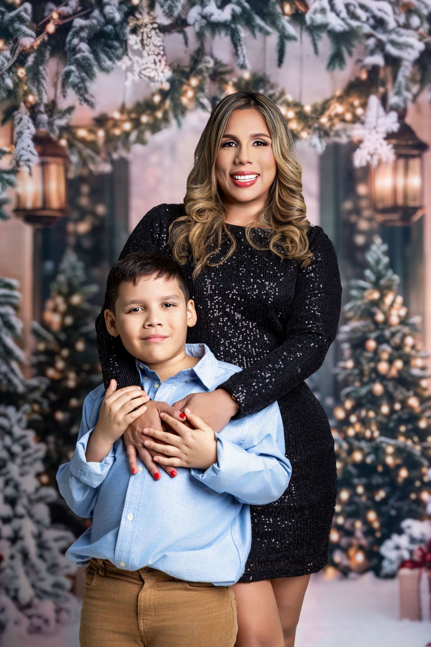 A festive holiday photo series with two people posing together against a backdrop of twinkling Christmas lights and decorations.