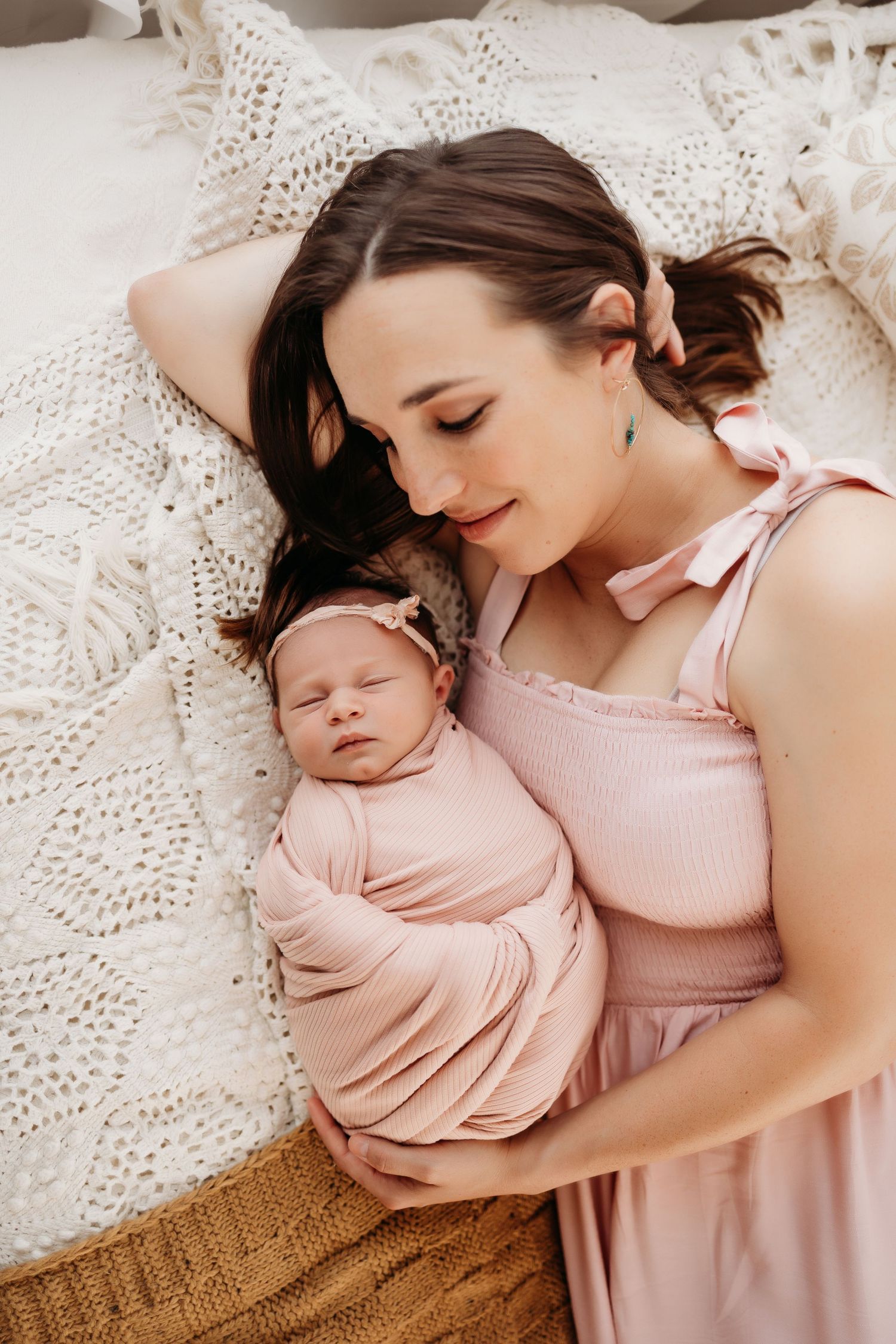 mommy and baby take a nap during photog session for precious photos
