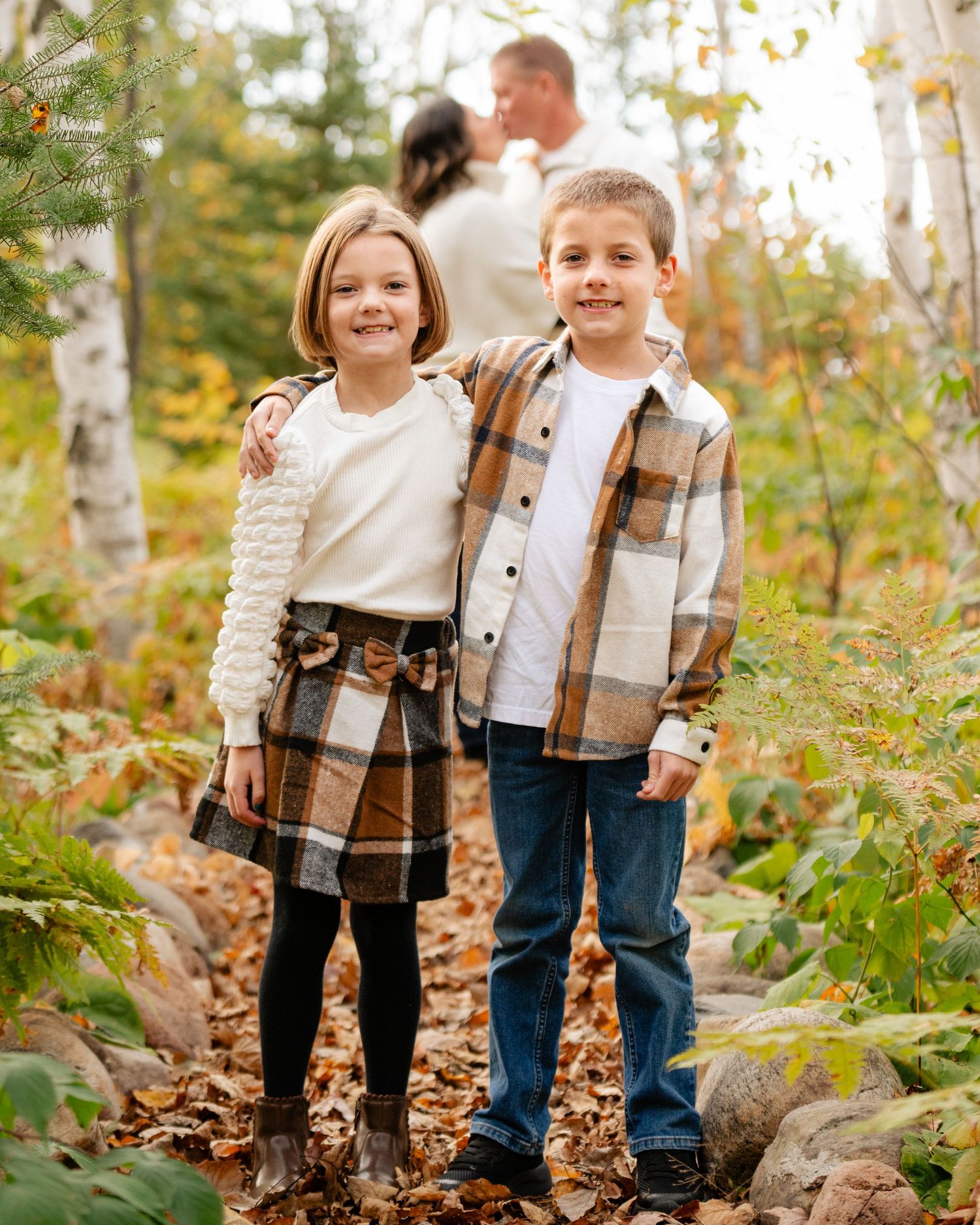 family photos in woods with children