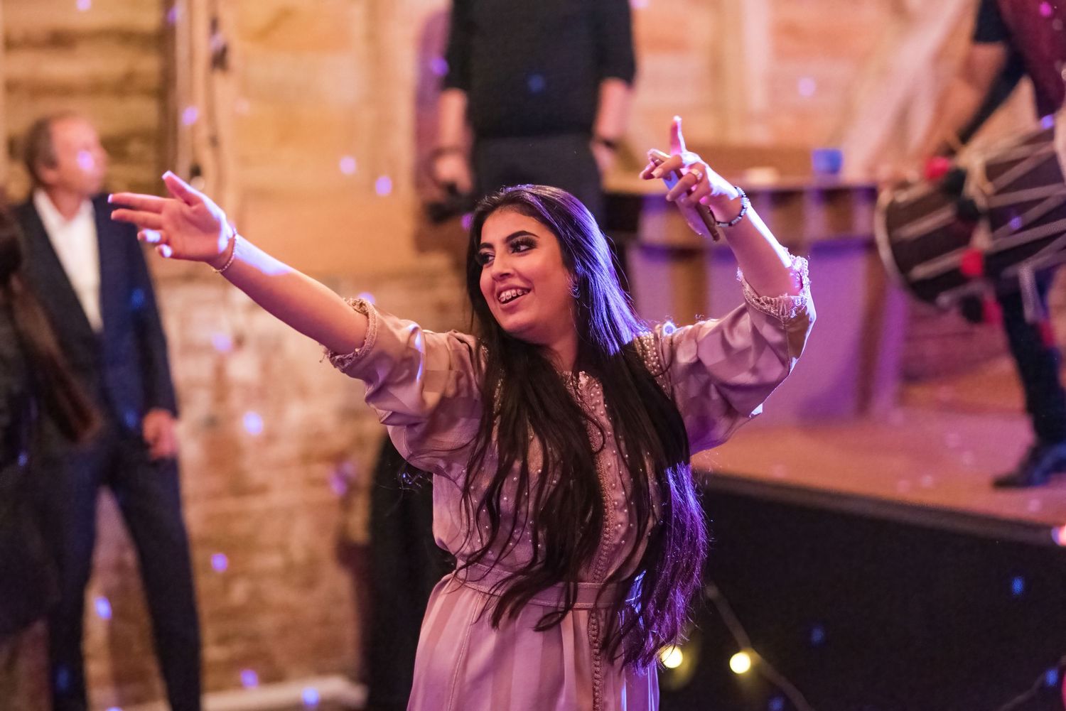 Girl dancing at a wedding reception