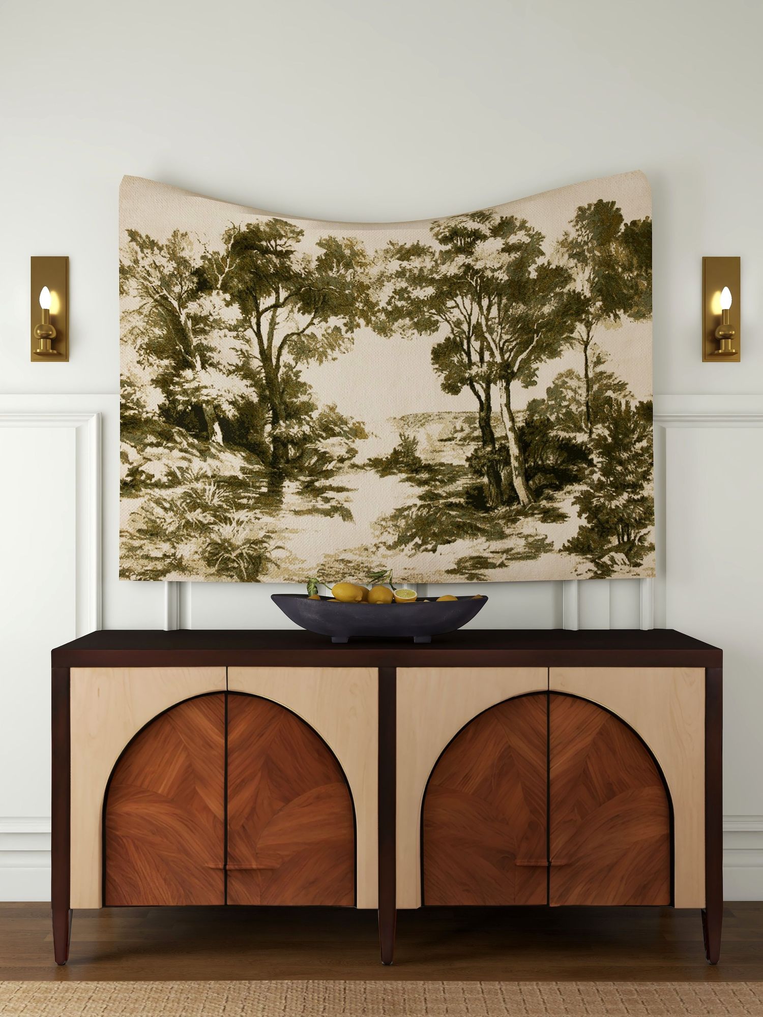 Modern traditional dining room with slipcovered chairs, rattan armchair, black table, vintage landscape art, and warm layered neutrals.