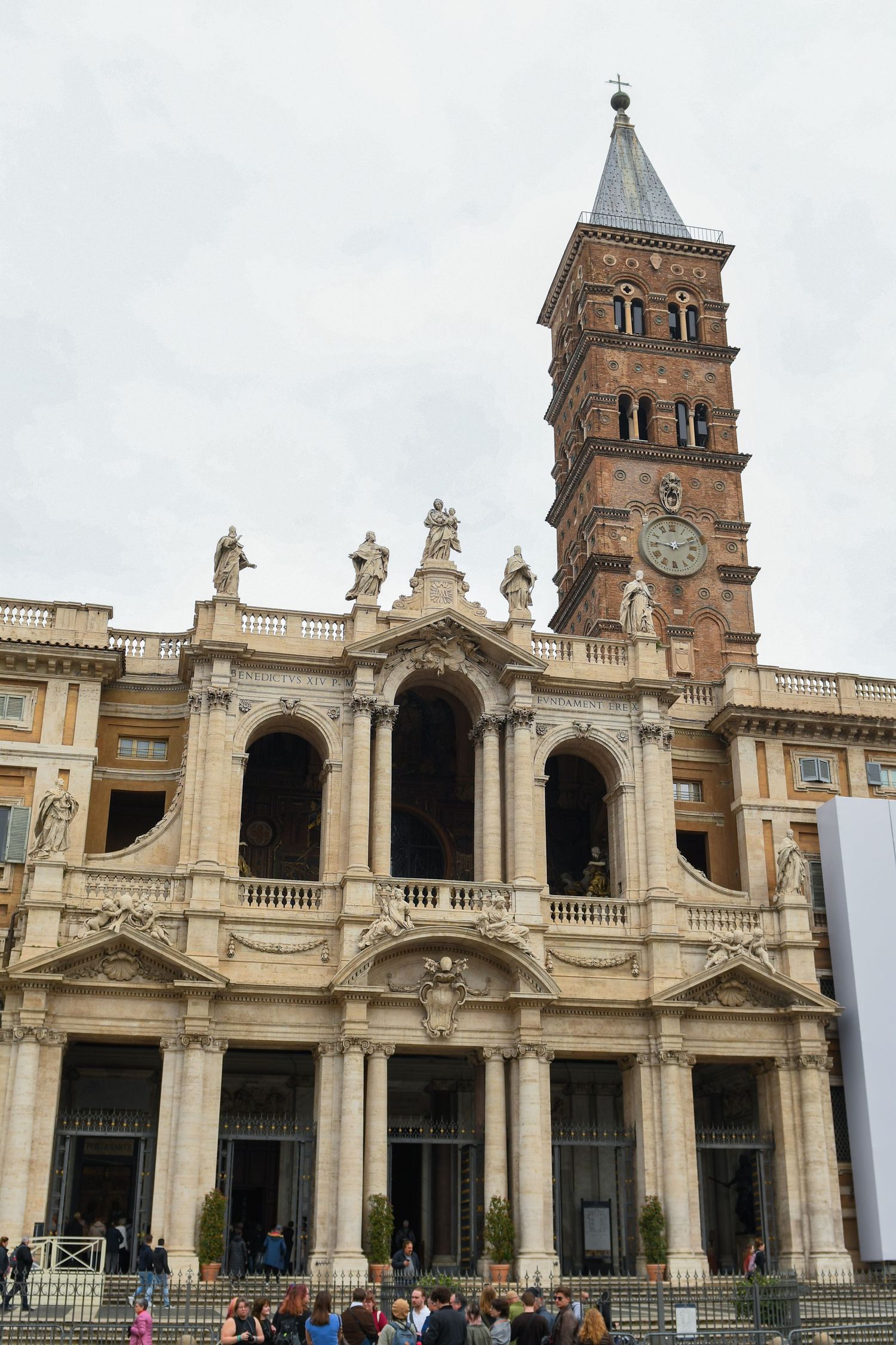 Exterior of the Basilica di Santa Maria Maggiore showcasing its grand Baroque architecture and bell tower.