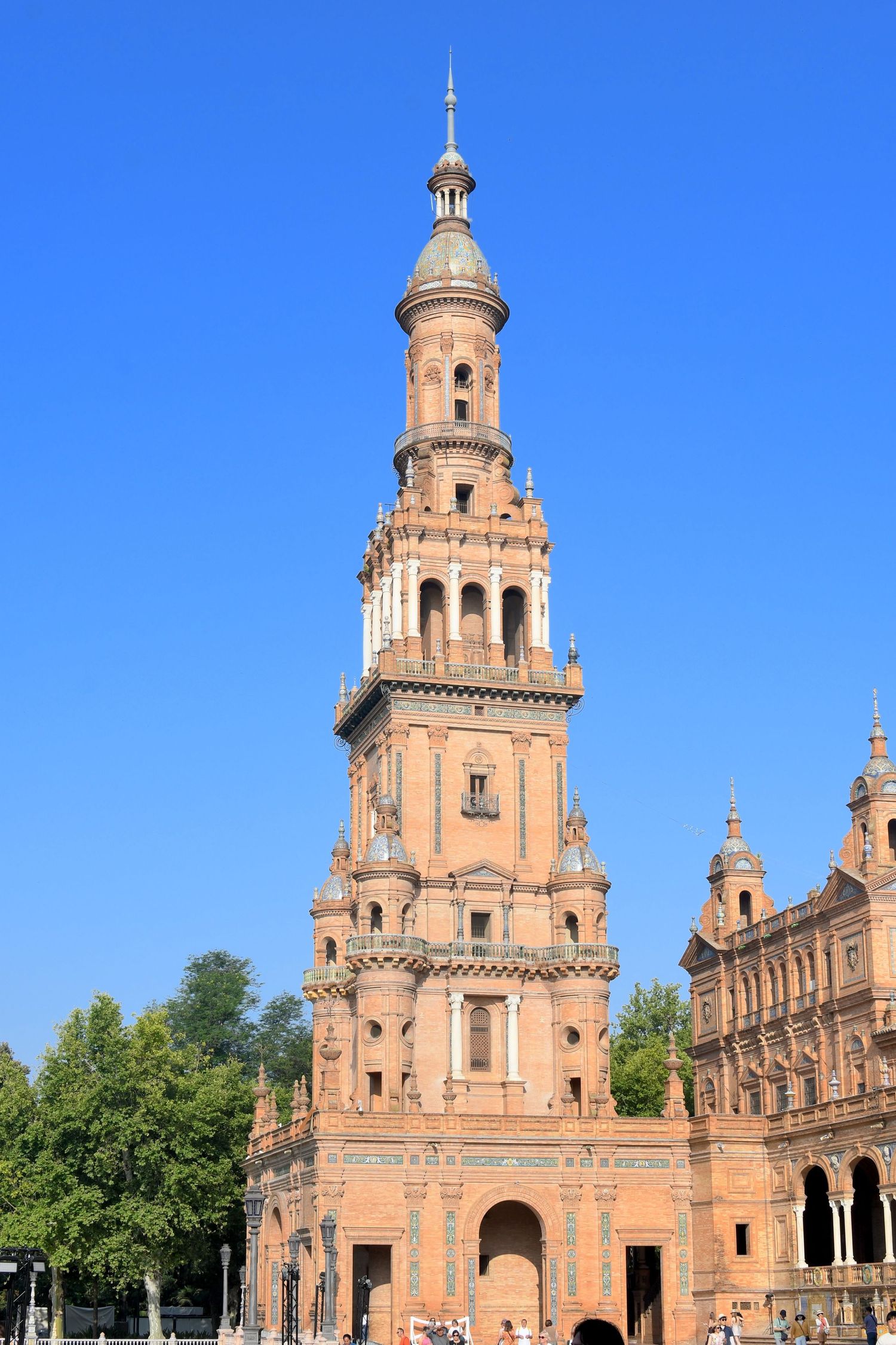Spanish colonial style church with ornate bell towers and terracotta colored facade.