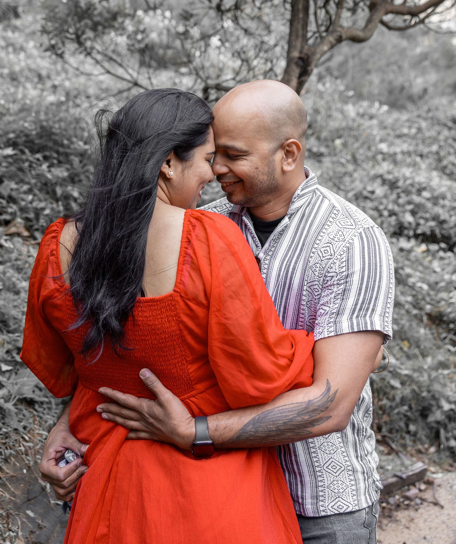 Couple beach shoot at golden hour with waves, love, and breathtaking views