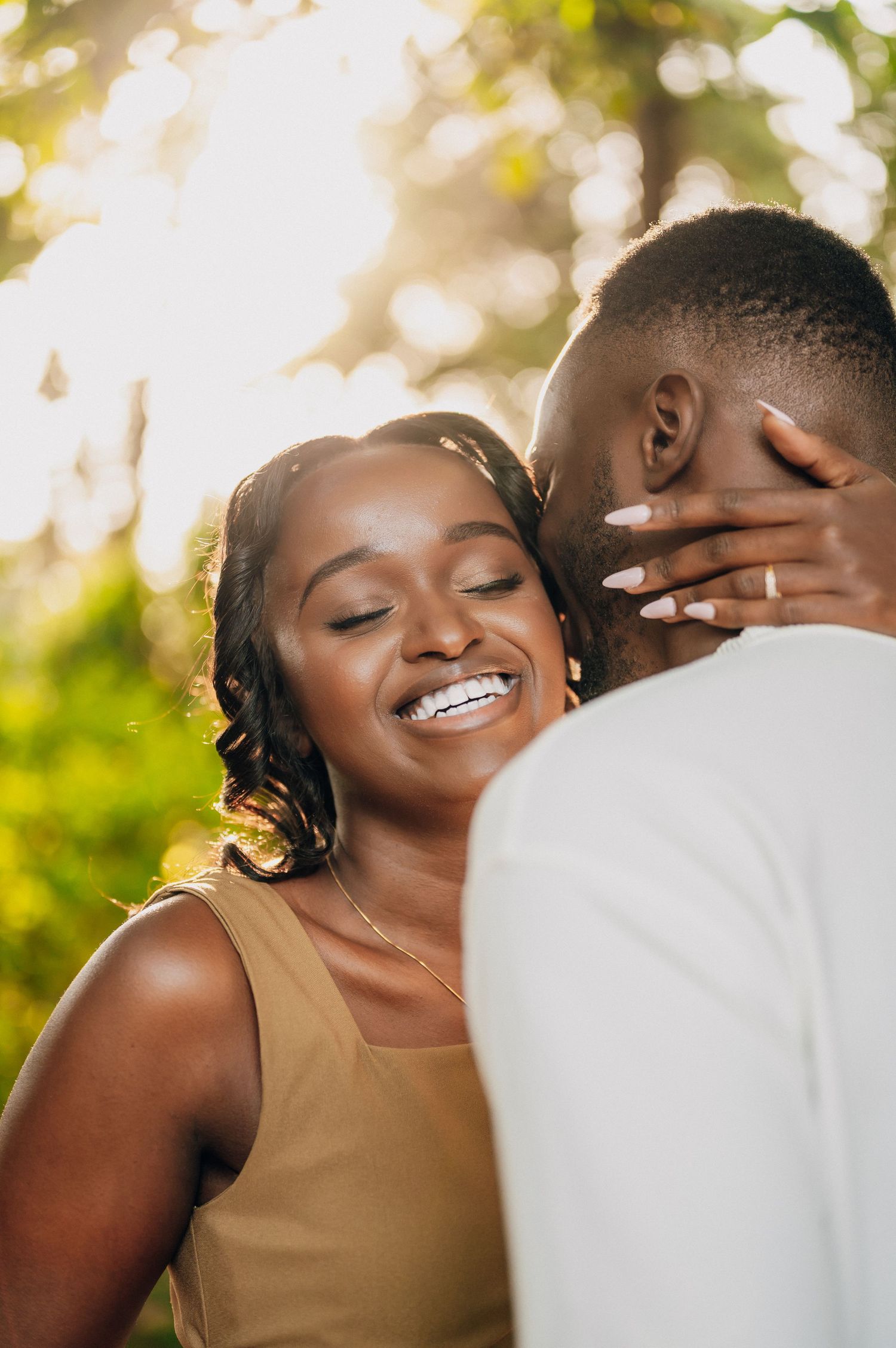 An intimate outdoor portrait session with soft bokeh lighting and natural expressions.