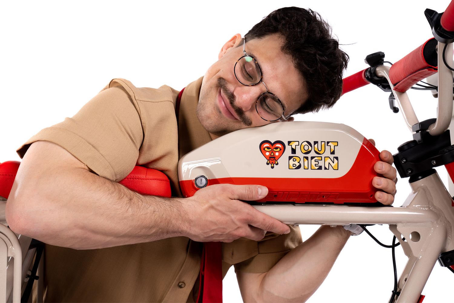 Close-up details of red and white custom motorcycle seat and frame design.