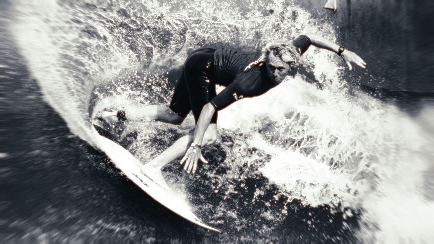 Series of black and white surfing action shots showing surfers riding waves.