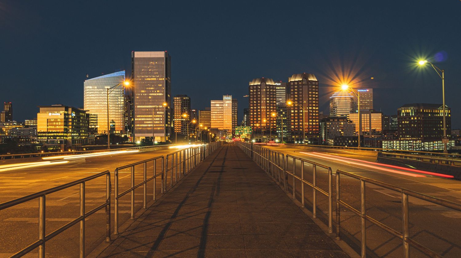 A wide shot of the city of Richmond Virginia at night.