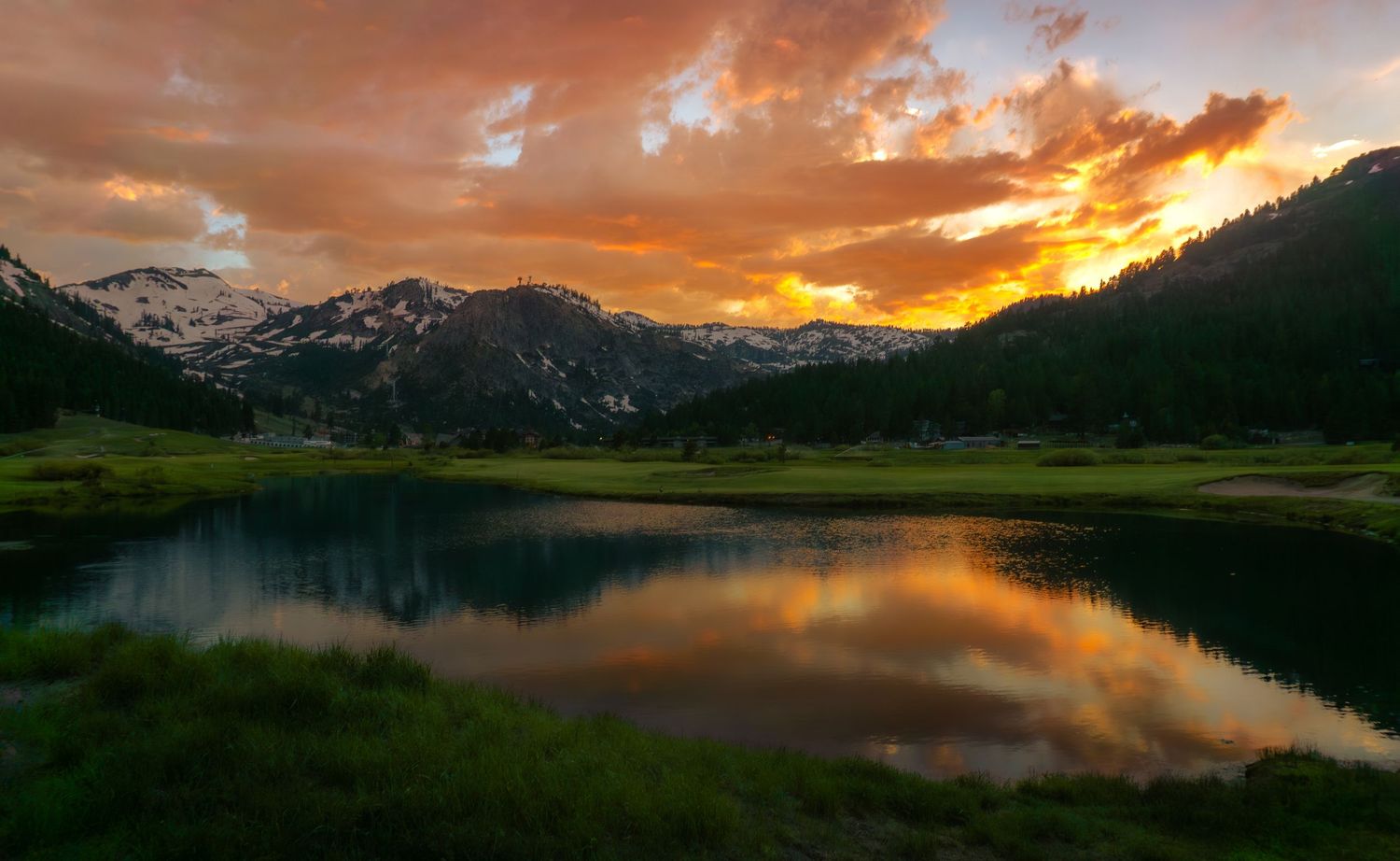 Dramatic wide-angle nature photograph of majestic mountains and under a moody sky by Vince Shewmaker.