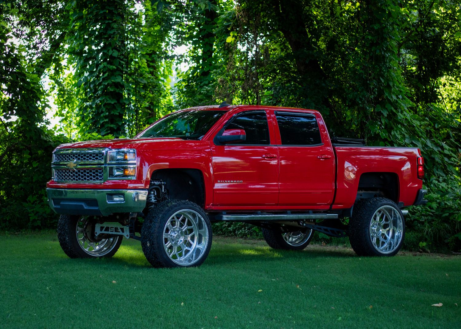 Lifted Chevy Silverado LT in the grass