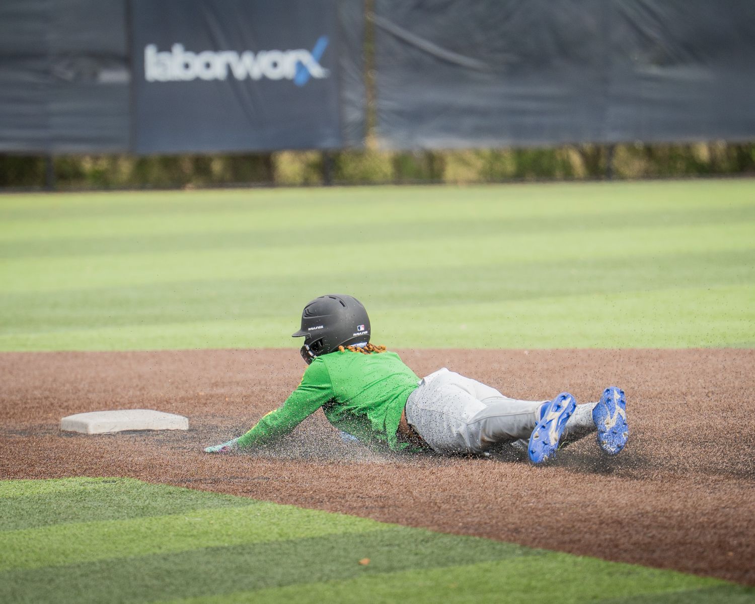 Baseball Sports Portrait action shot of Atlanta Men's Padres team runner stealing second base