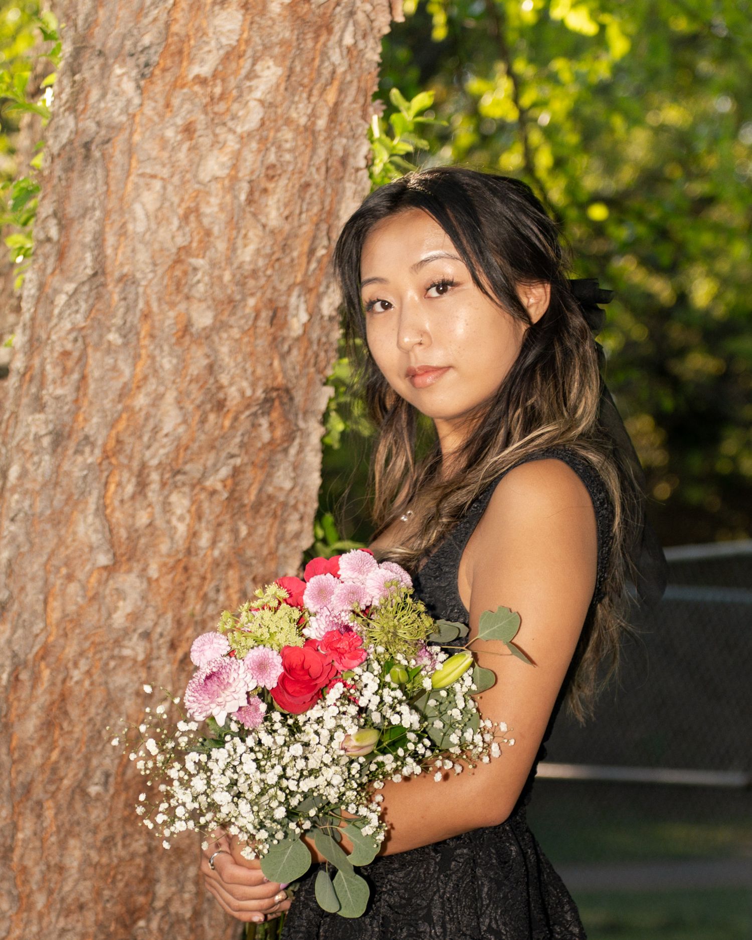 Portrait Photo at Perkerson Park in Atlanta, GA with tree and flowers