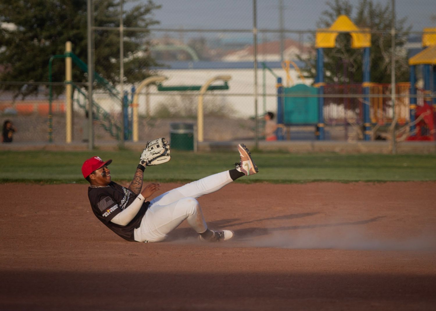 Baseball Sports Portrait action shot of Brenden Jones diving catch