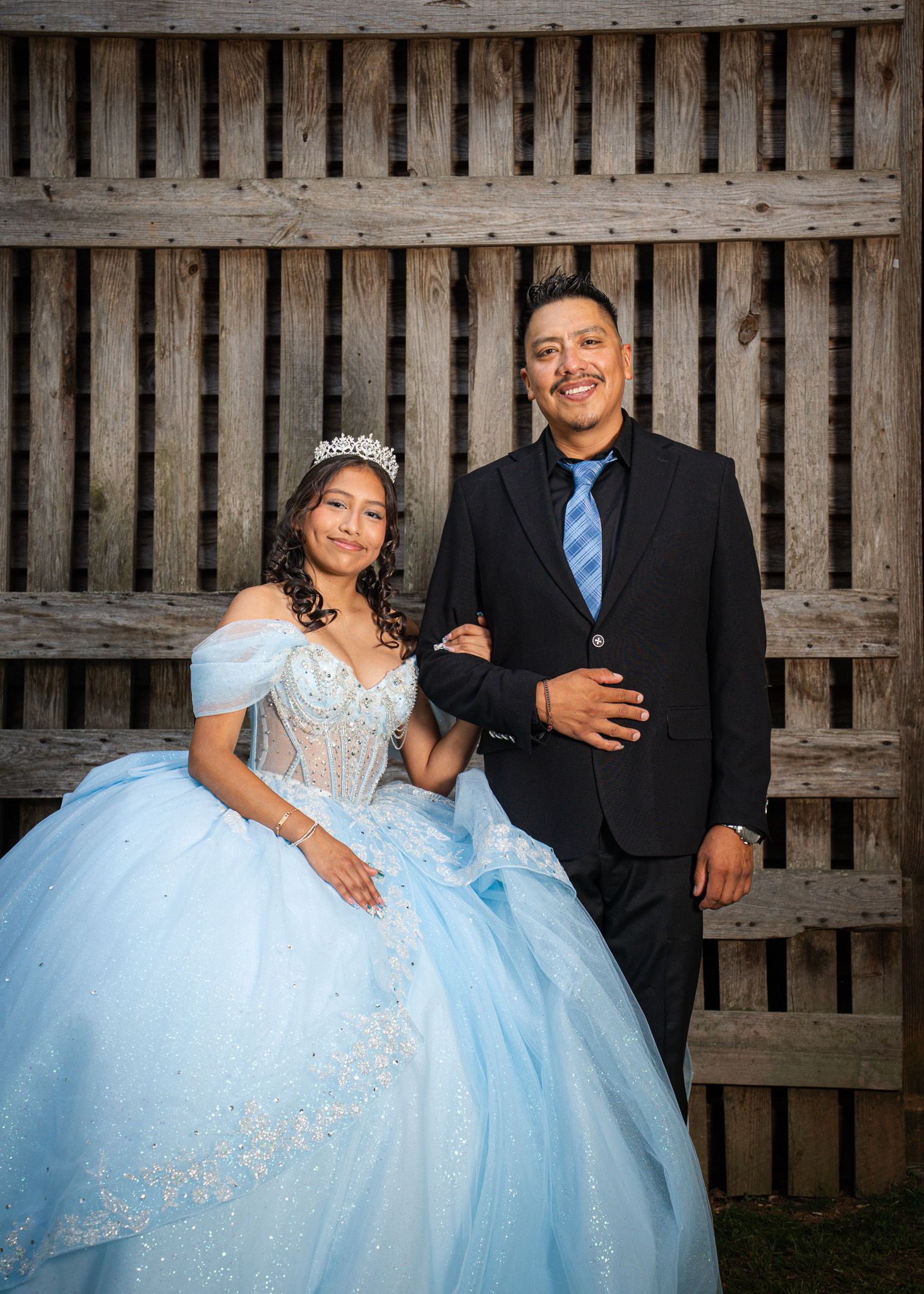 Quinceañera portraits with dad and daughter taken at McDaniel's Farm in Duluth, Georgia