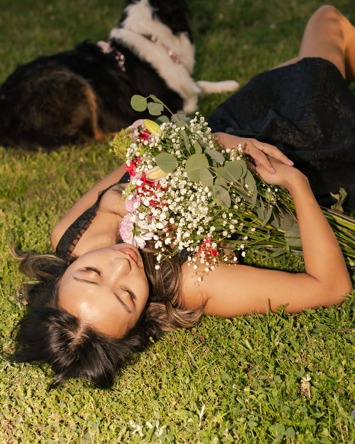 Portrait Photo at Perkerson Park in Atlanta, GA in the grass with flowers and black dress