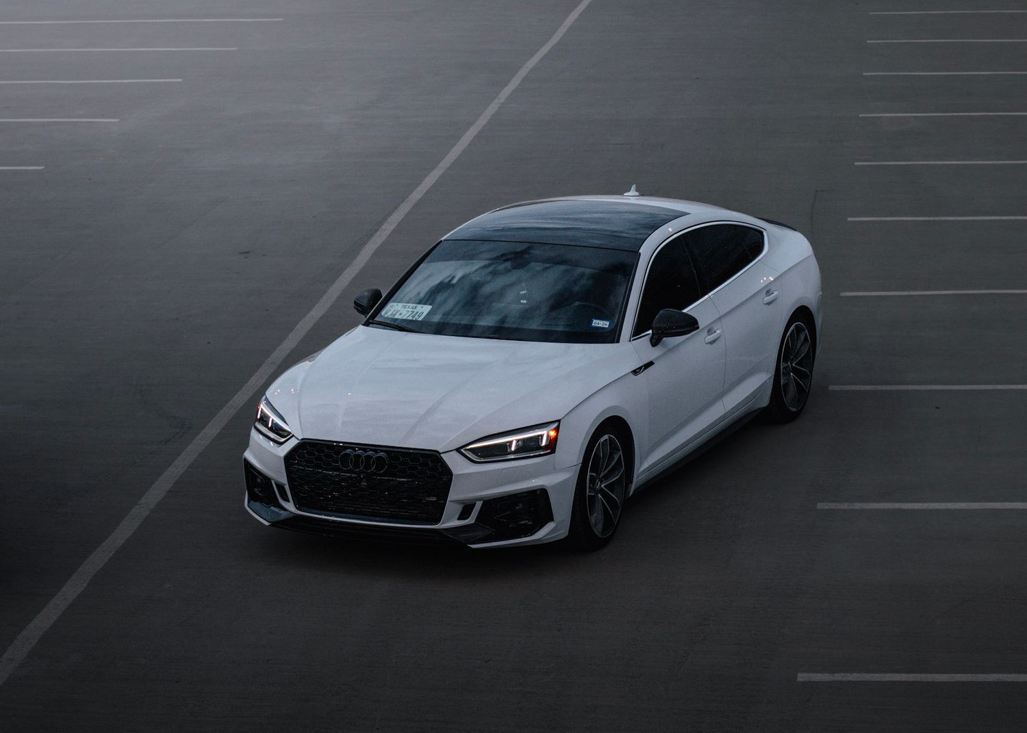 Audi car at top of parking garage in El Paso, TX