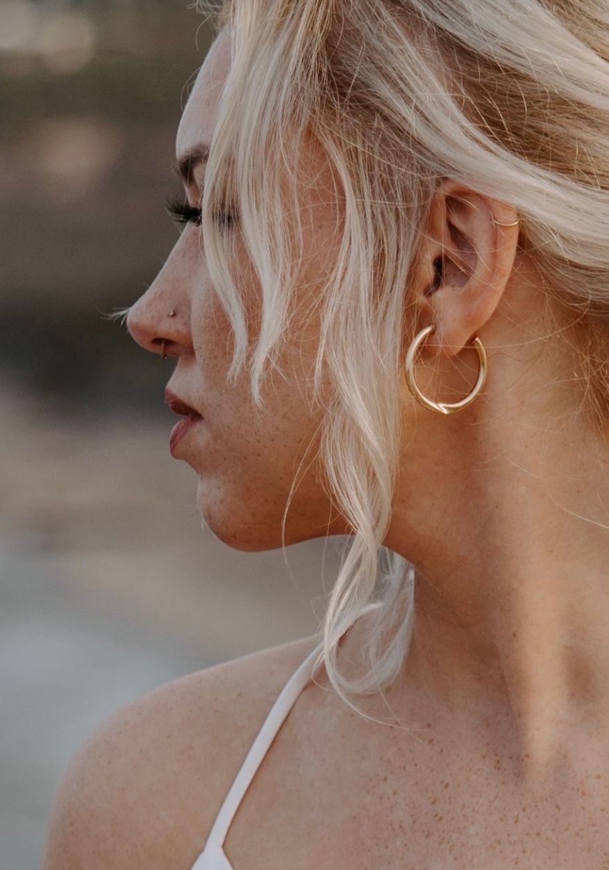Profile views show a woman with blonde hair and gold hoop earrings in natural lighting.