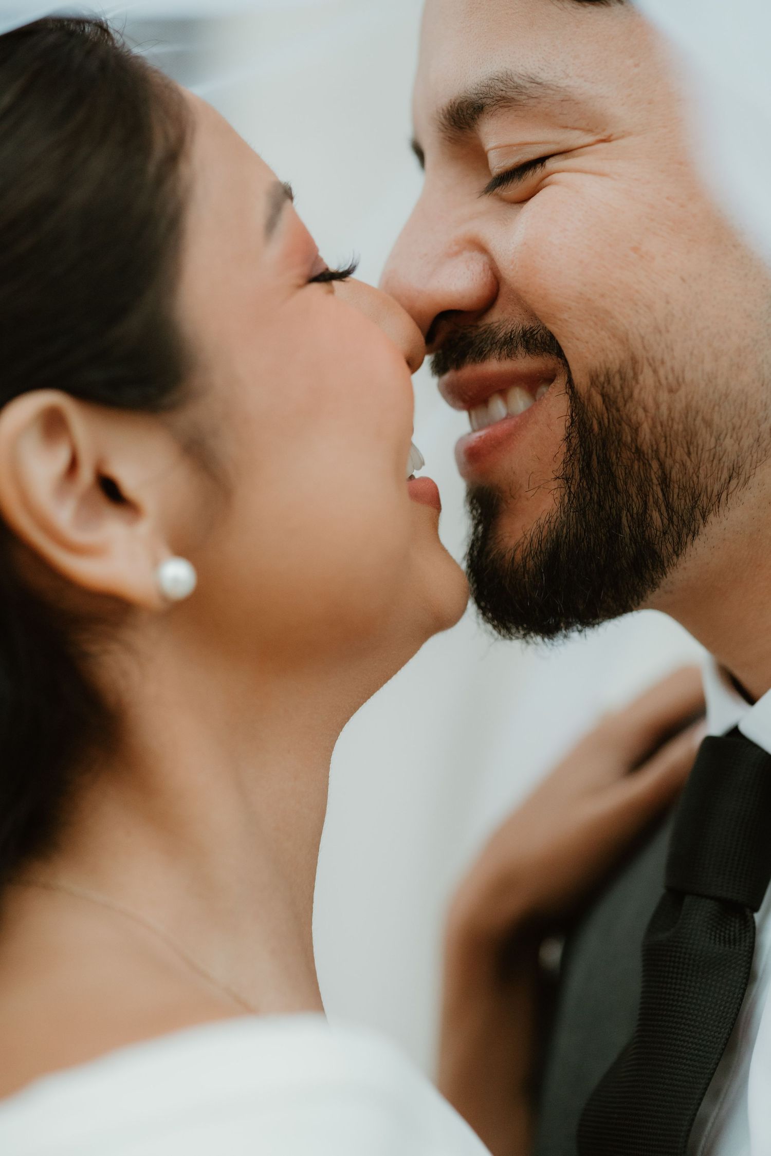 Close up side profile closeup shots showing an intimate moment between a couple.