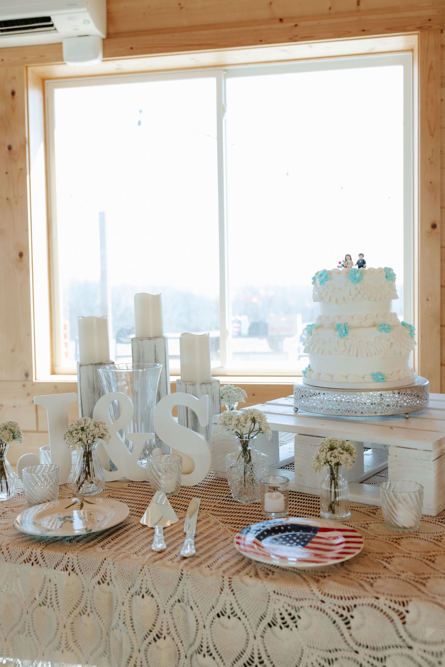 Wedding reception details and table settings at Sparks Barn in Nebraska