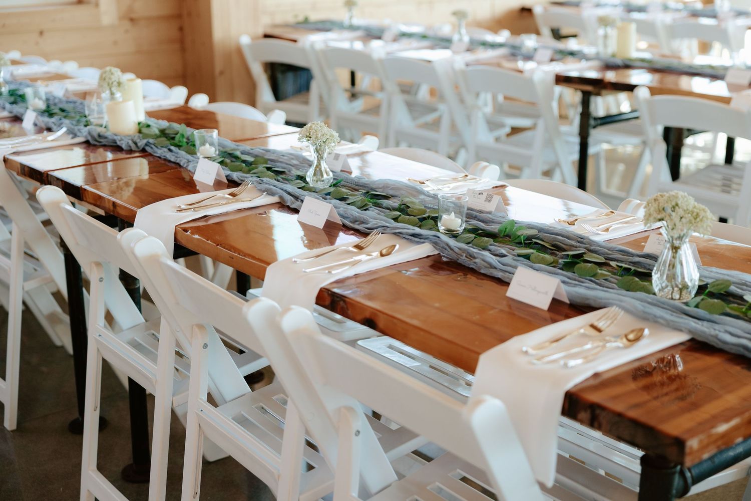 Wedding reception details and table settings at Sparks Barn in Nebraska