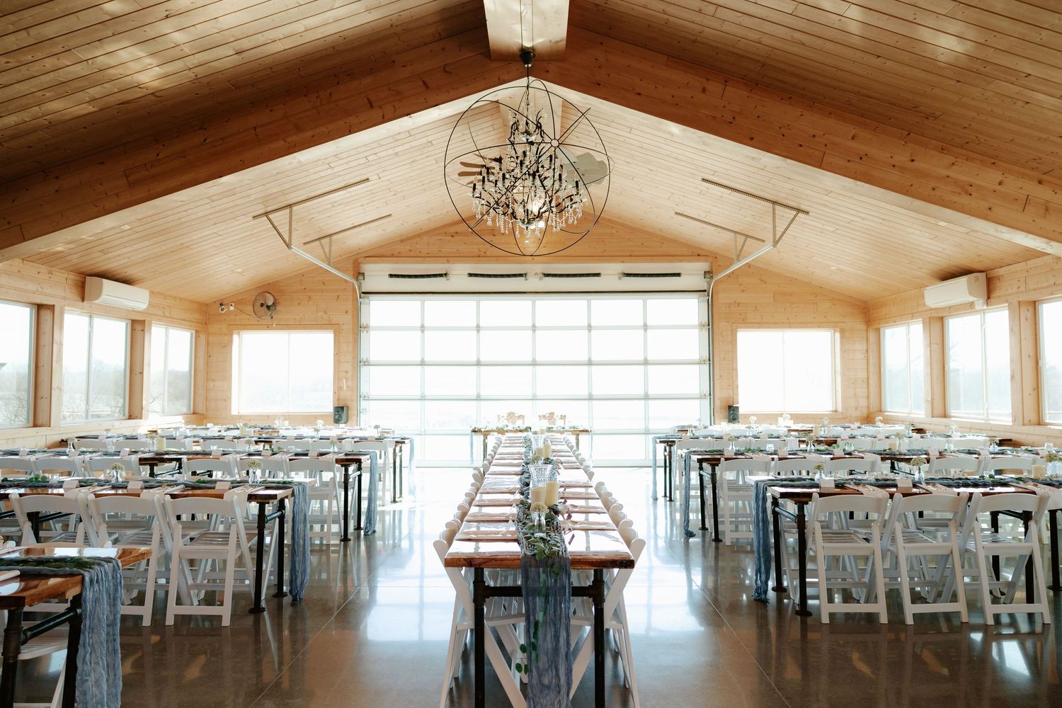 Wedding reception details and table settings at Sparks Barn in Nebraska