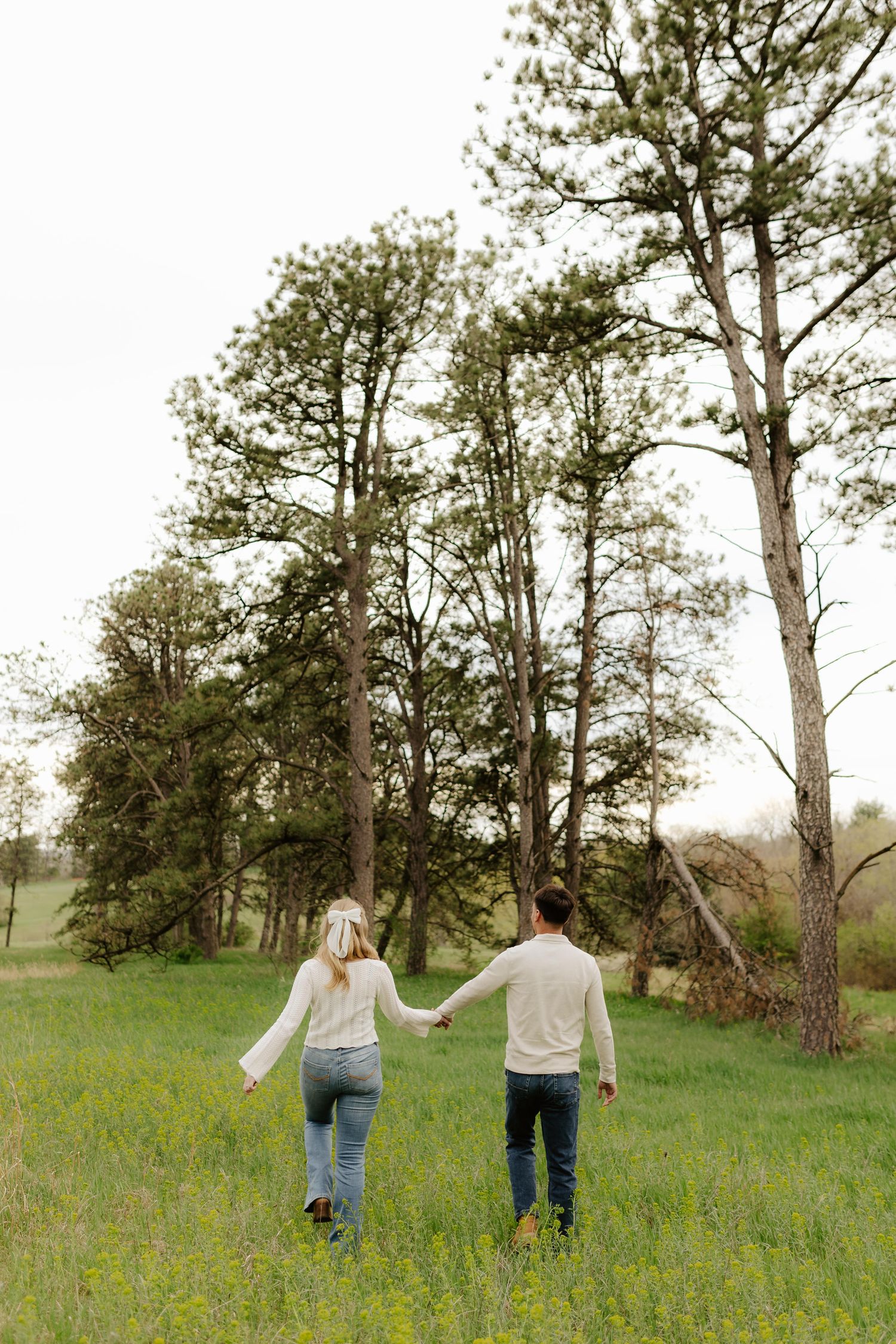 Engagement photography at Pioneers Park in Lincoln, NE. Romantic outdoor session with natural light, perfect for Nebraska couples