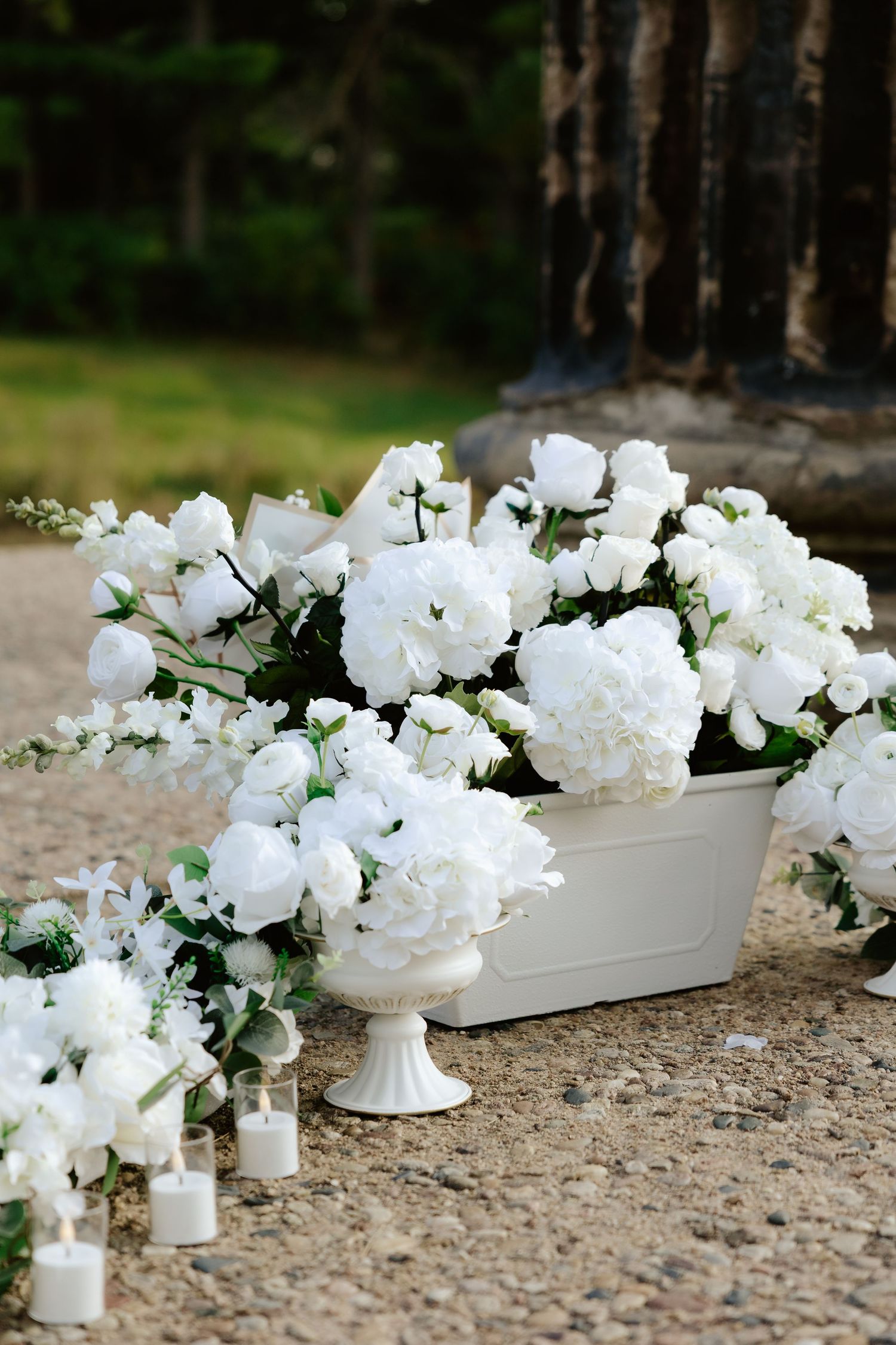 White florals set up for a sunset proposal at the Pillars at Pioneers Park in Lincoln, NE.