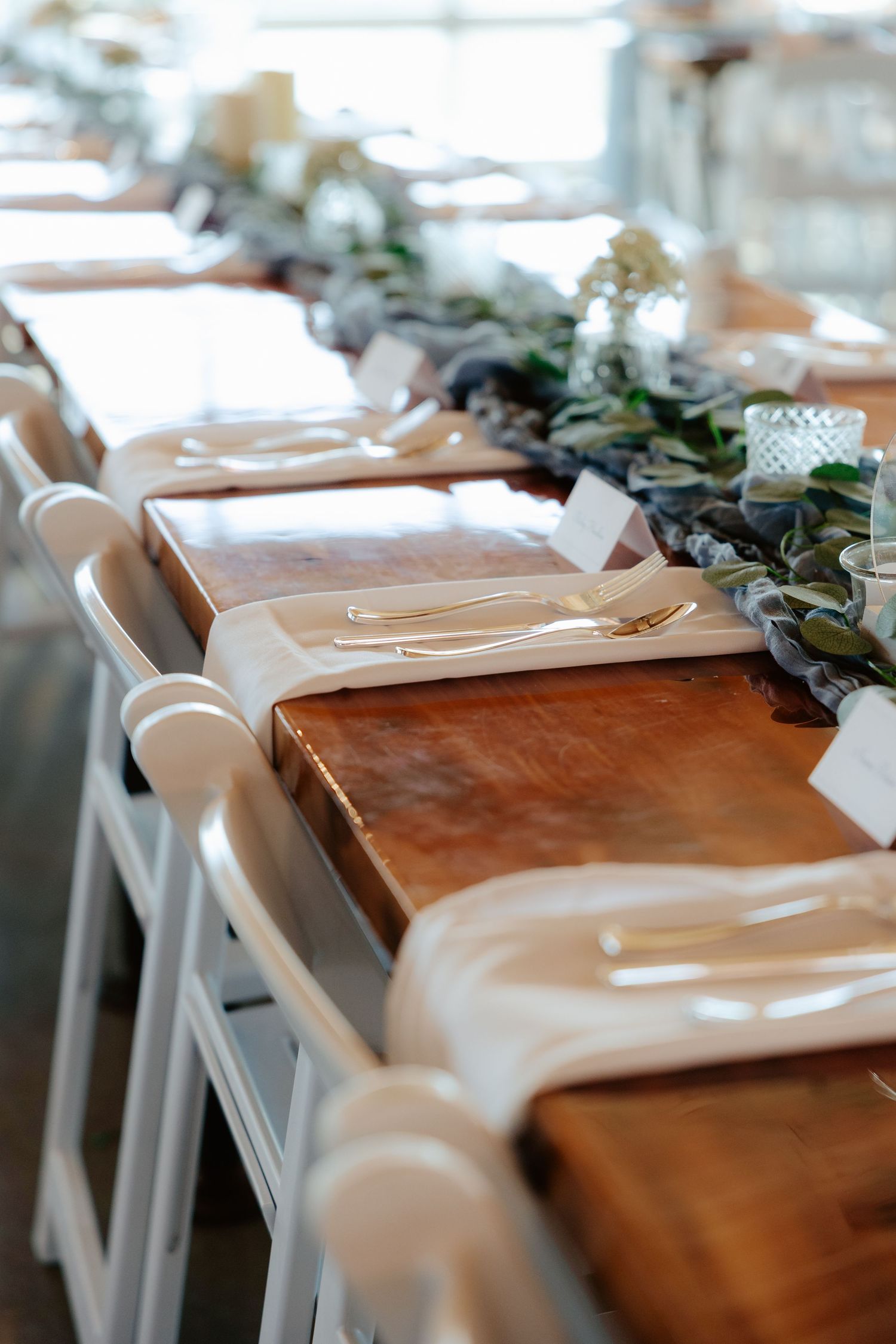 Wedding reception details and table settings at Sparks Barn in Nebraska