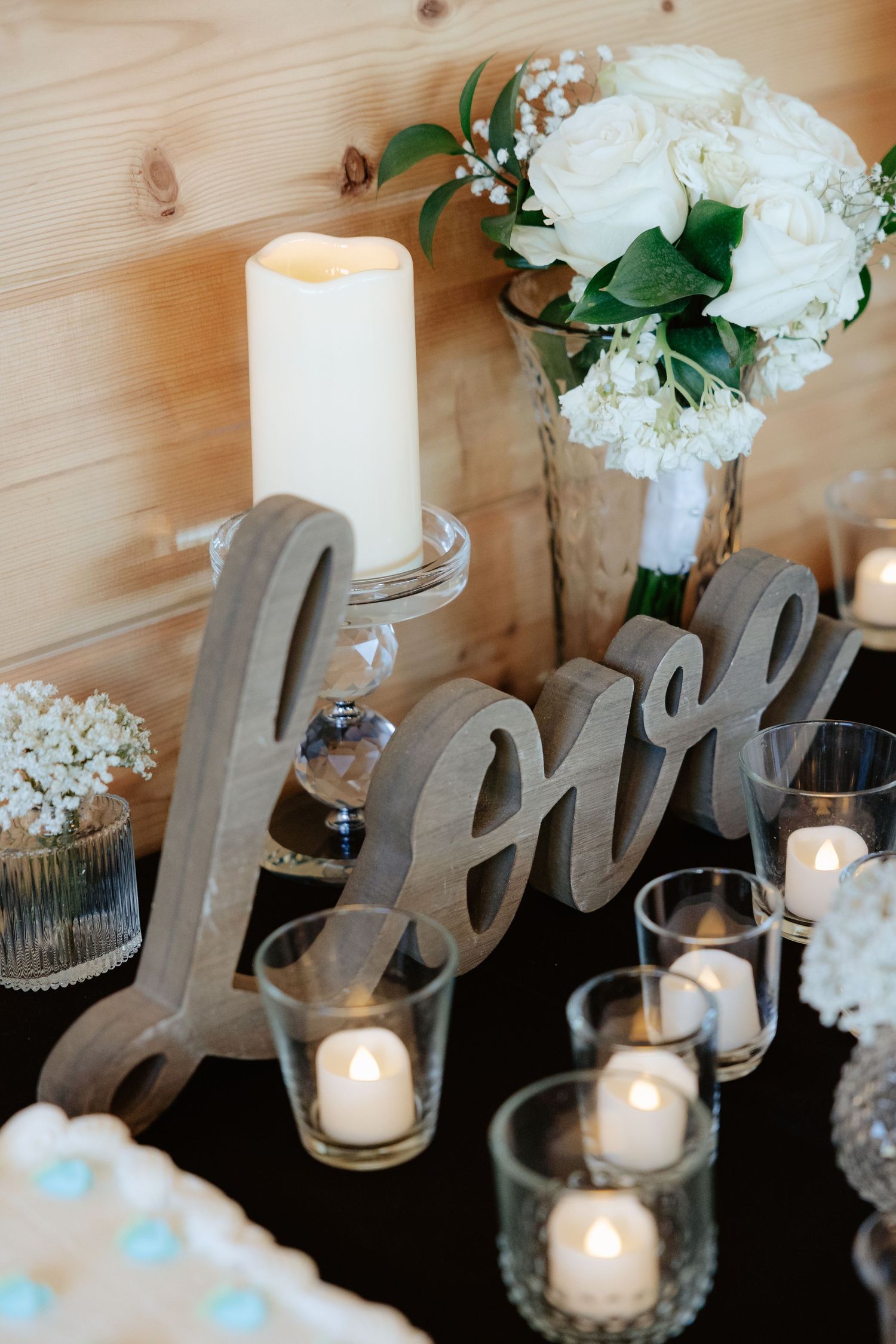 Wedding reception details and table settings at Sparks Barn in Nebraska
