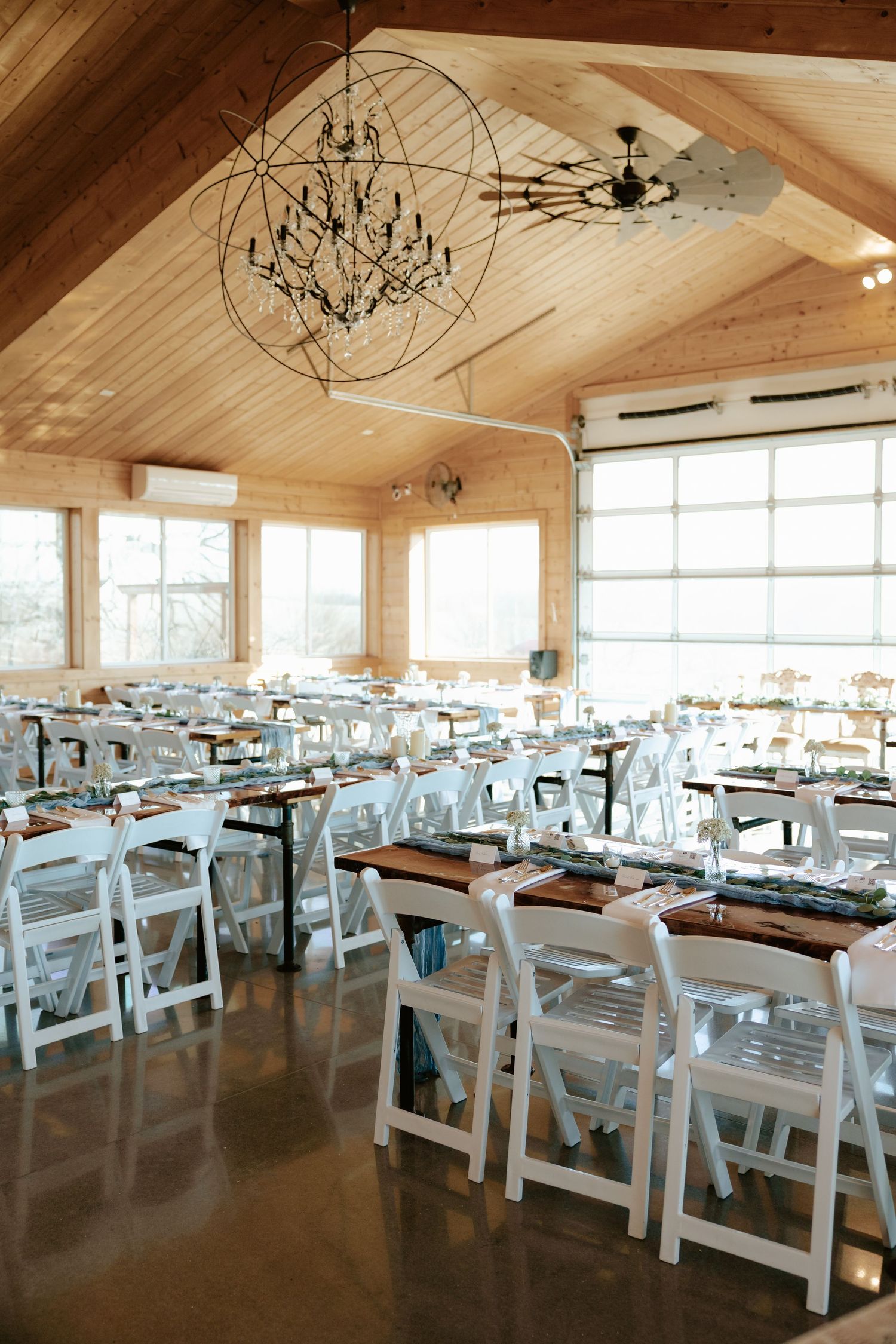 Wedding reception details and table settings at Sparks Barn in Nebraska