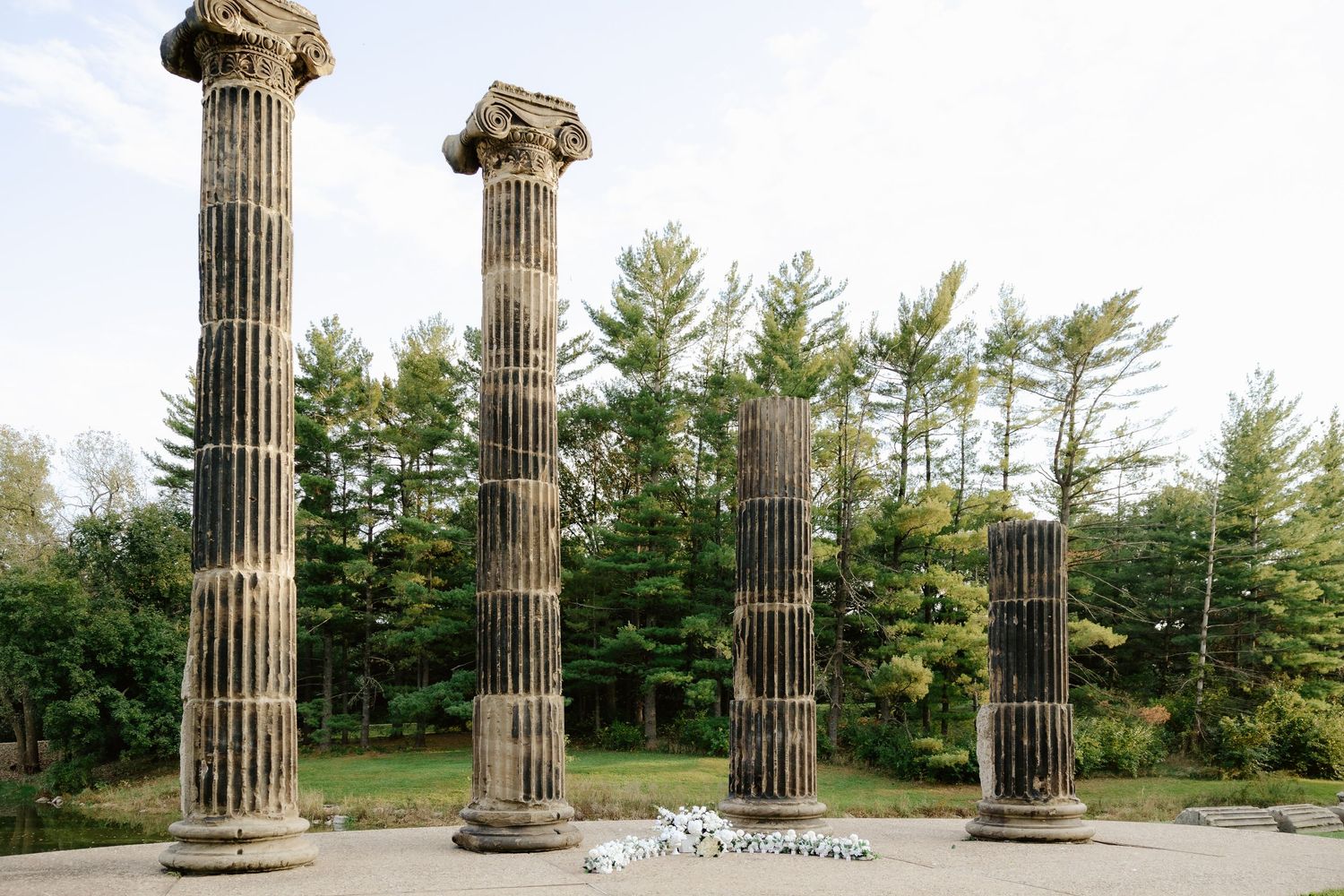 White florals set up for a sunset proposal at the Pillars at Pioneers Park in Lincoln, NE.