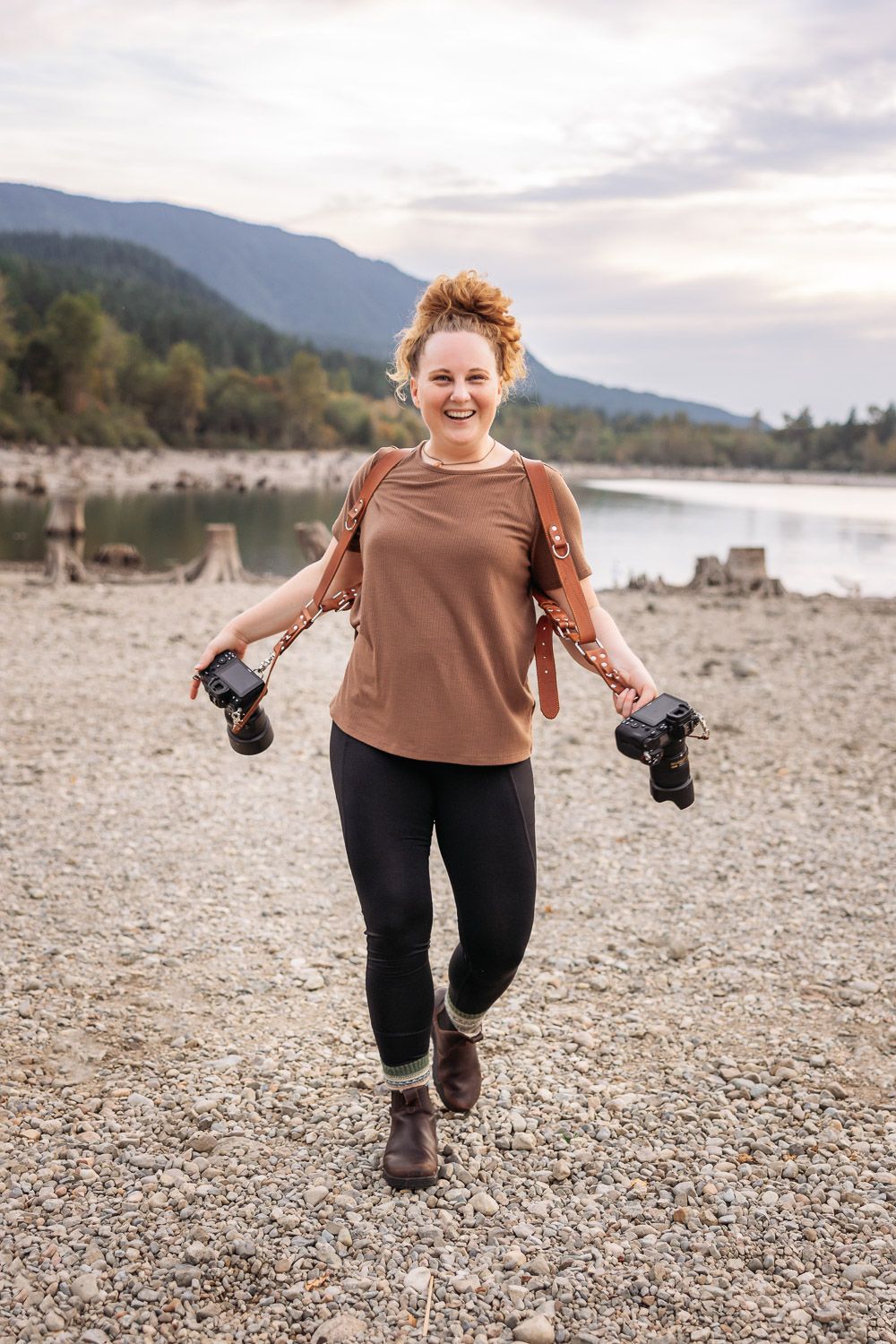 Photo of Tori Shults, the photographer and owner of Pine + Vow wearing a brown shirt. She is a Washington Elopement photographer.