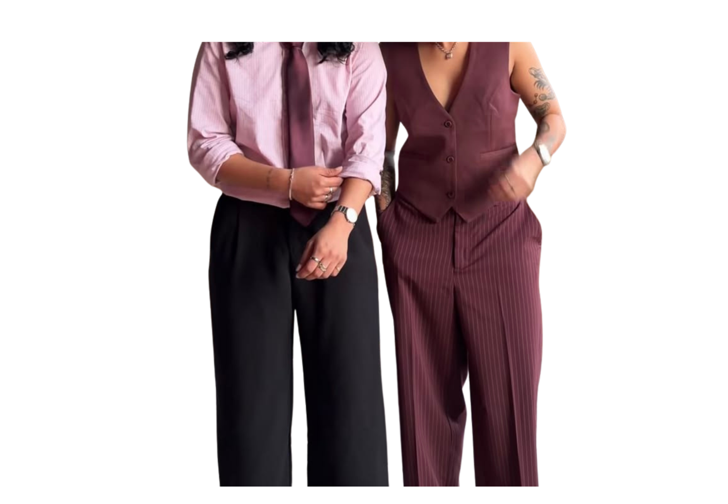 Two people wearing coordinated burgundy and black dress pants outfits, showcasing modern professional fashion styles.