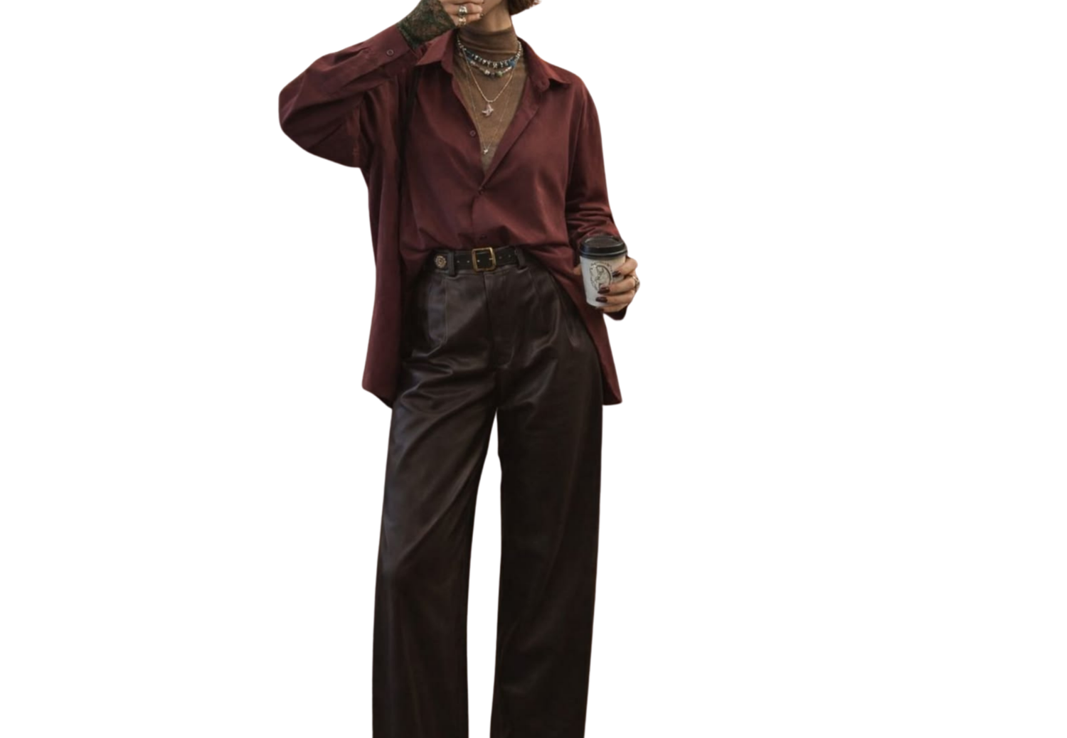 Person wearing a burgundy oversized button-up shirt with dark brown wide-leg trousers and a belt.