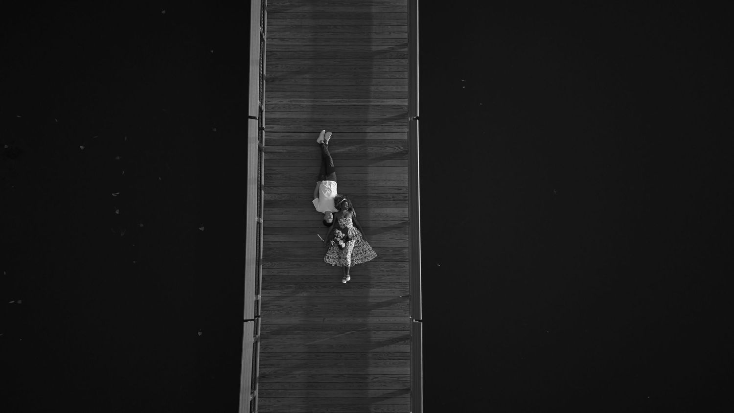 Six sequential frames show a person performing a backflip off a diving board against a dark background.