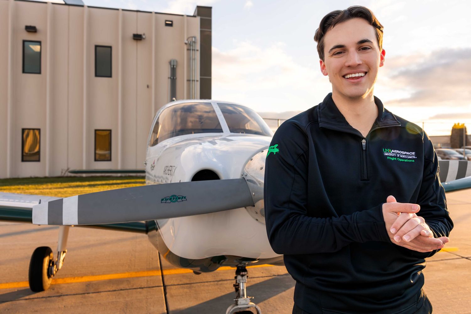 A series of exterior shots showing a person in dark clothing next to an aircraft.