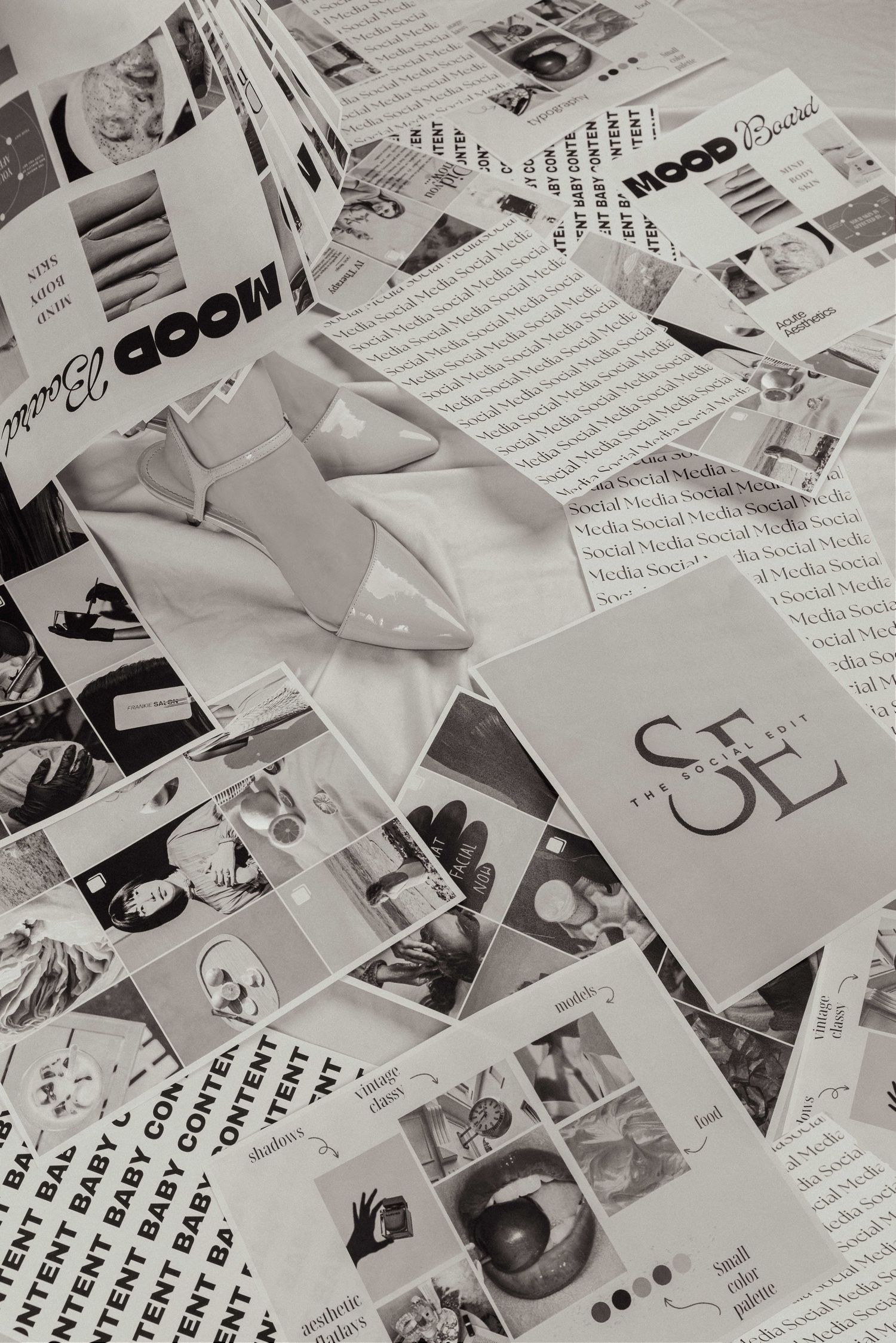 Black and white collage of magazine clippings and typography featuring the word 'Goom' and various design elements.