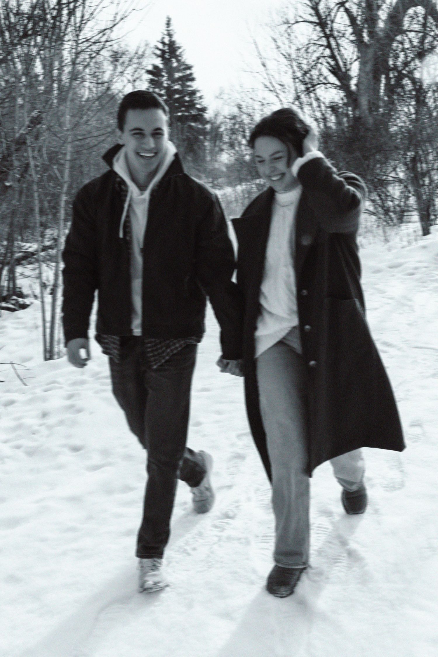 Candid shots of joyful running through snowy winter scenery.
