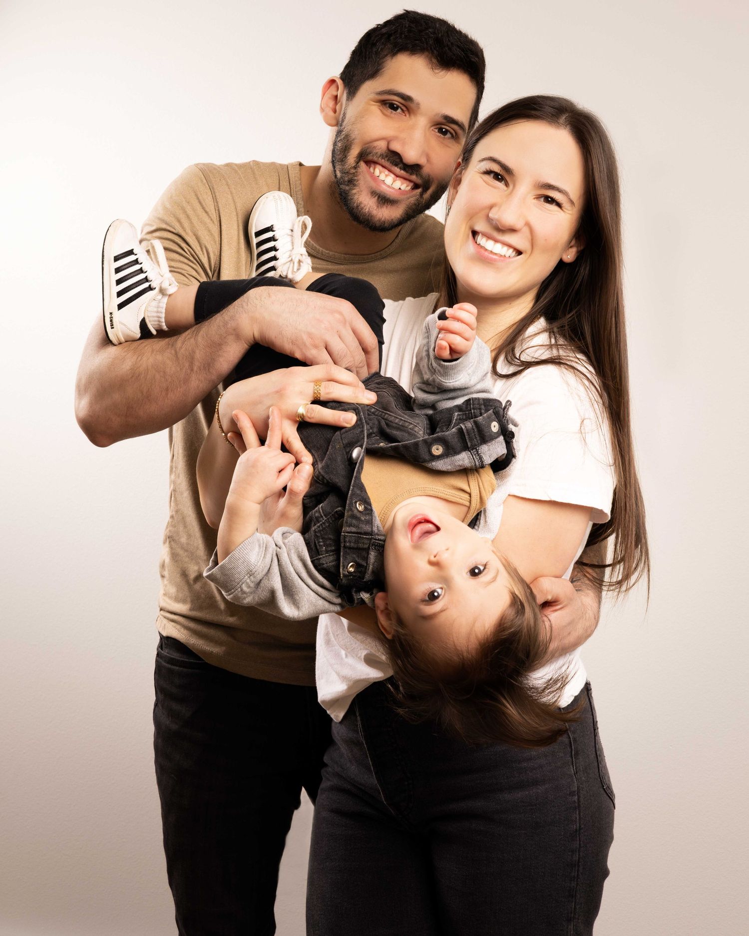 Playful family photo sequence showing joyful moments and laughter against white background.
