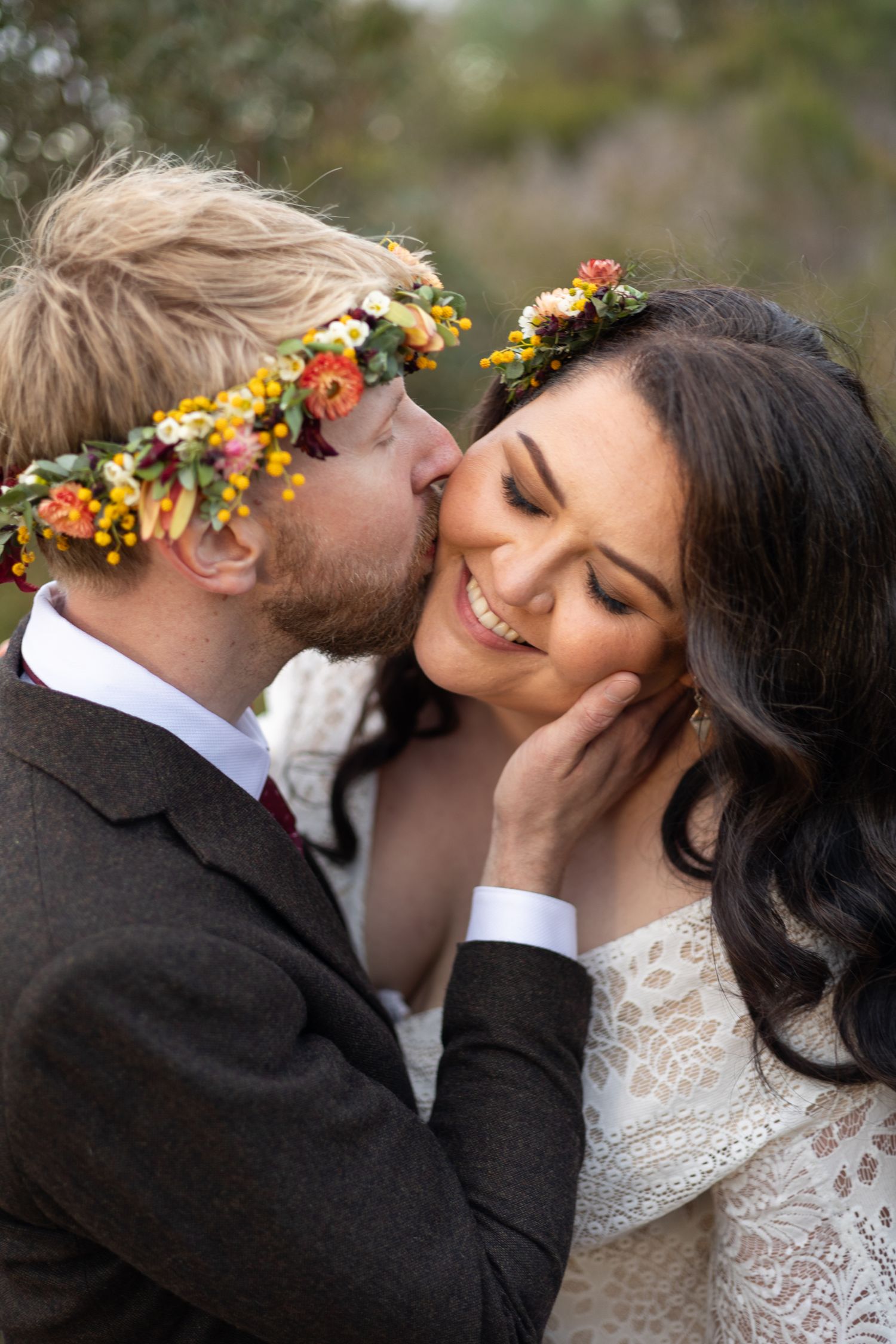 Romantic wedding couple wearing floral crown and lace dress share intimate moments in series of close-up photos.