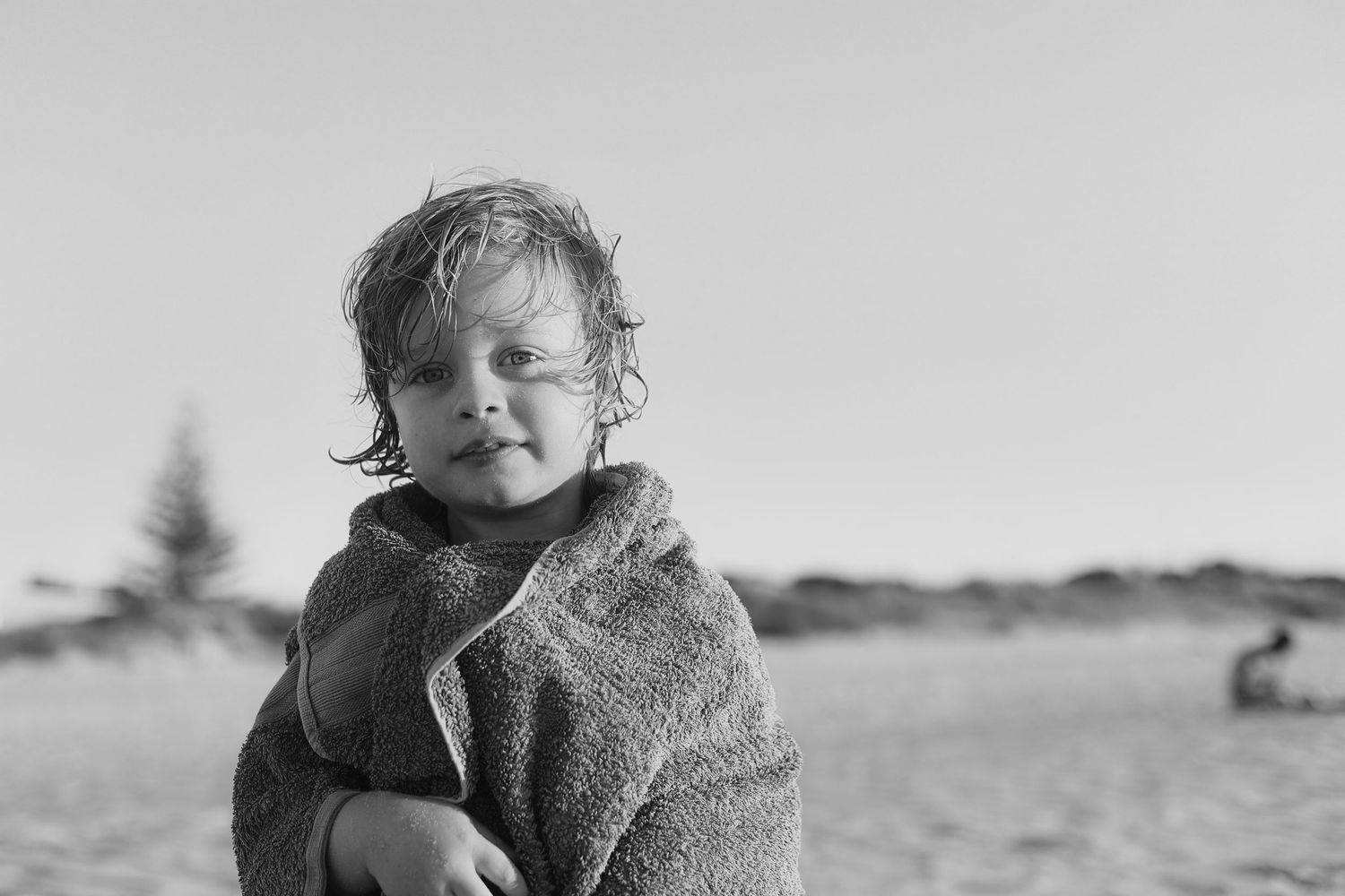 Black and white portrait series showing candid outdoor moments. Perth family photography