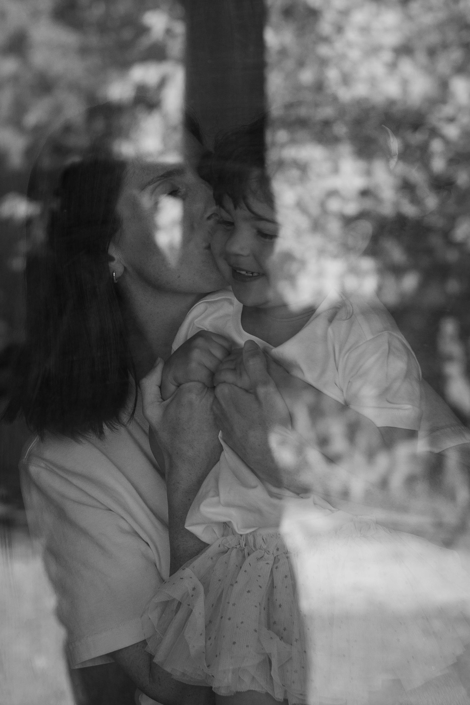 Vintage black and white portrait series showing candid emotional moments. Family in home documentary photography Perth Freo
