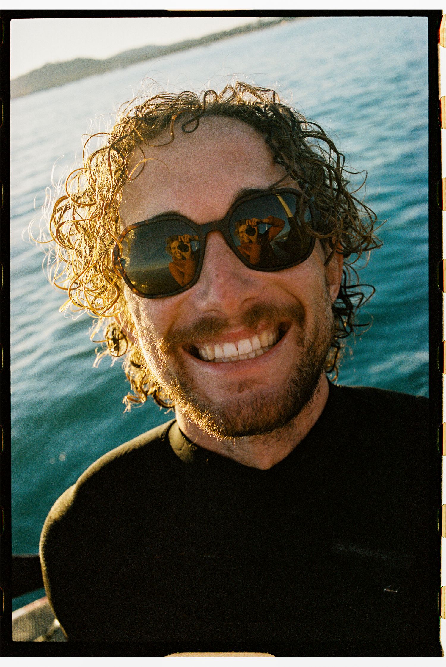 Smiling friend on a boat