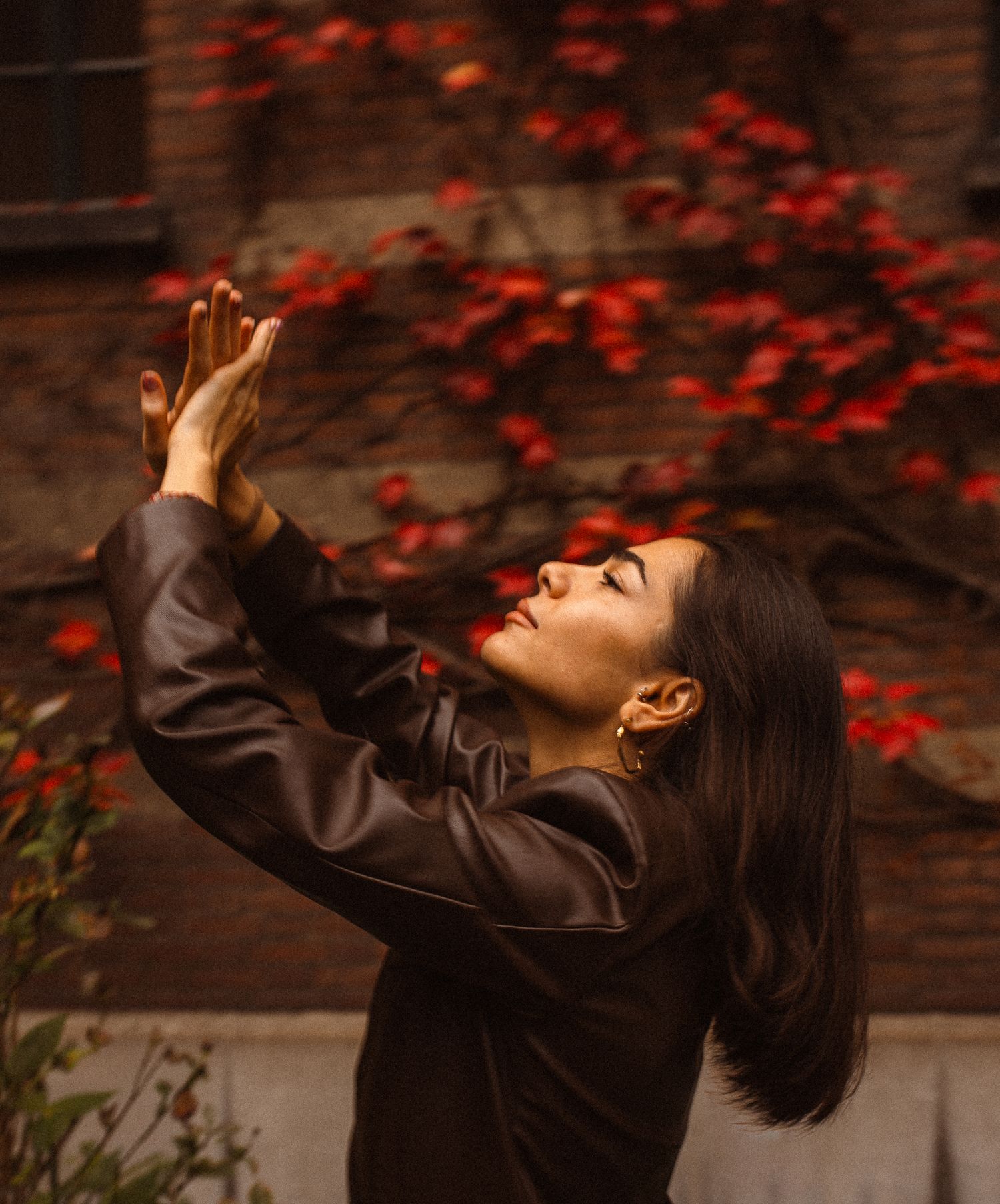 Subject in motion, hair and clothing moving with the wind.