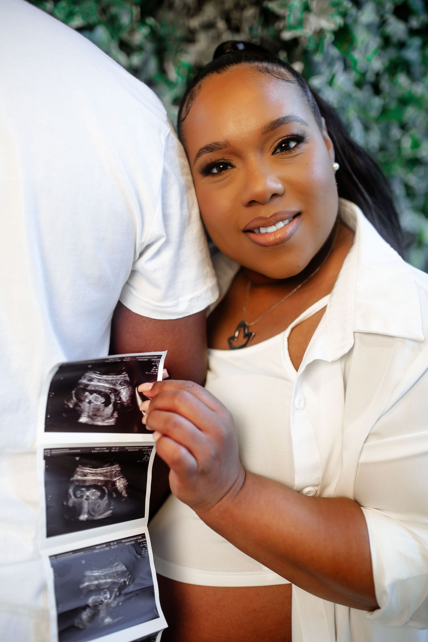 A series of four photos showing someone in a white top holding up ultrasound images with a joyful expression.