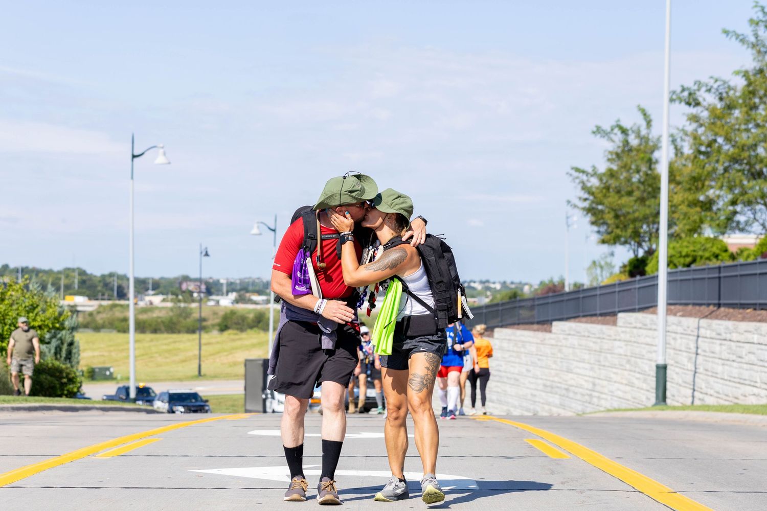 marchers kissing during 50 mile march